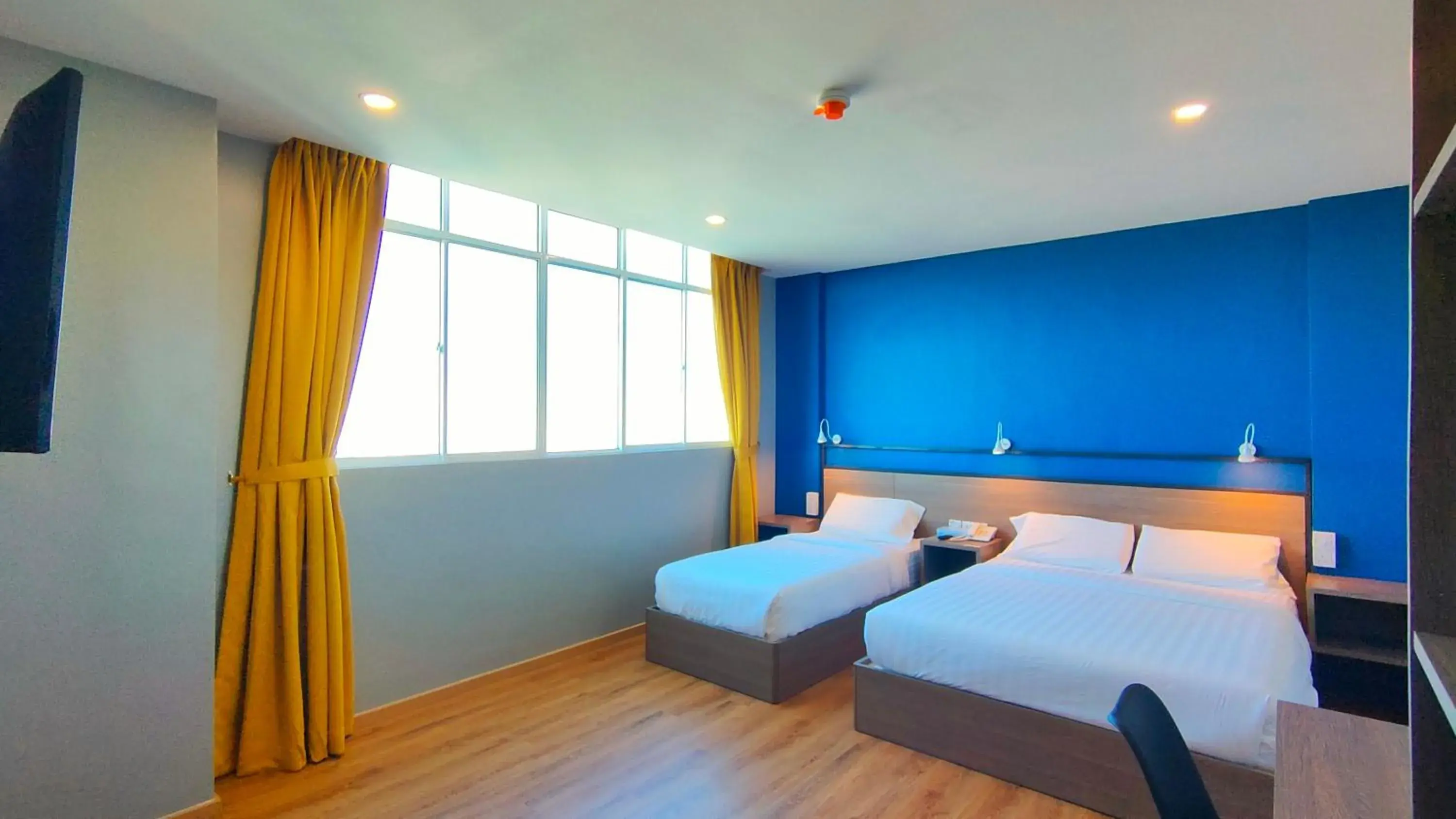 View (from property/room), Bed in Uptown Hotel View (from property/room), Bed in Uptown Hotel