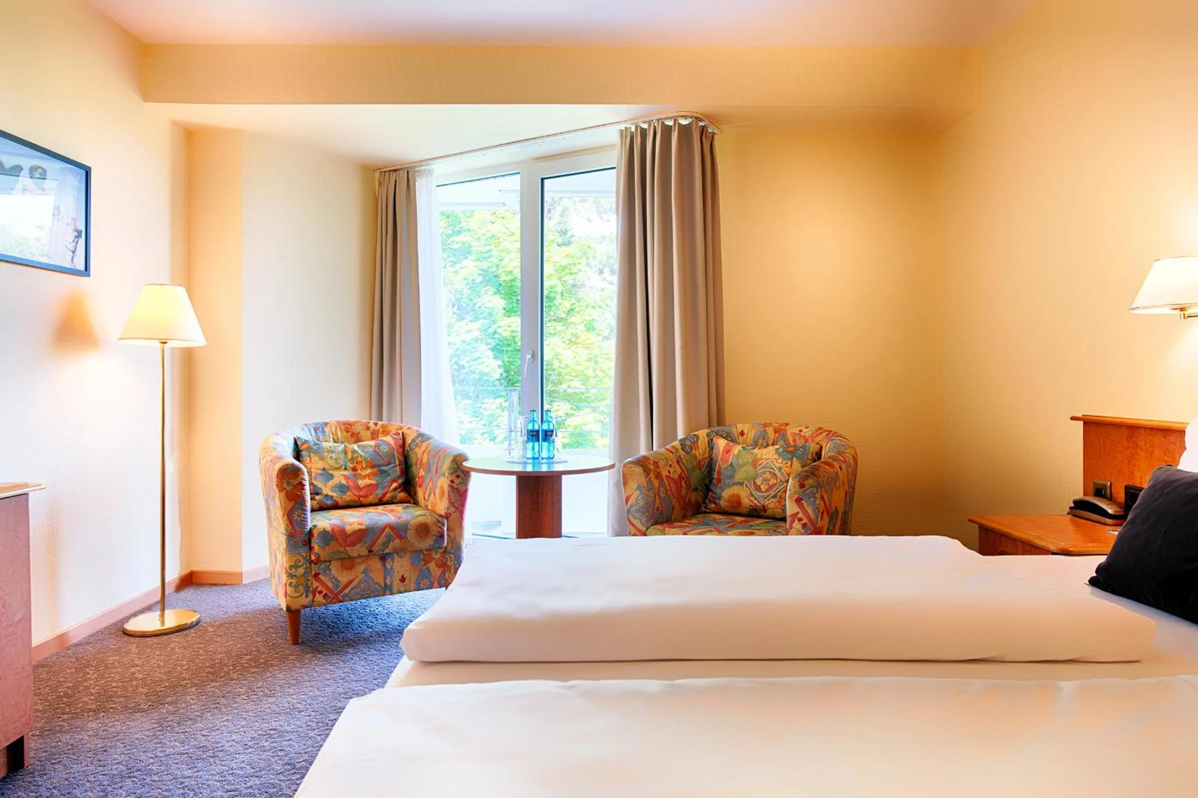 Photo of the whole room, Bed in ACHAT Hotel Bad Dürkheim