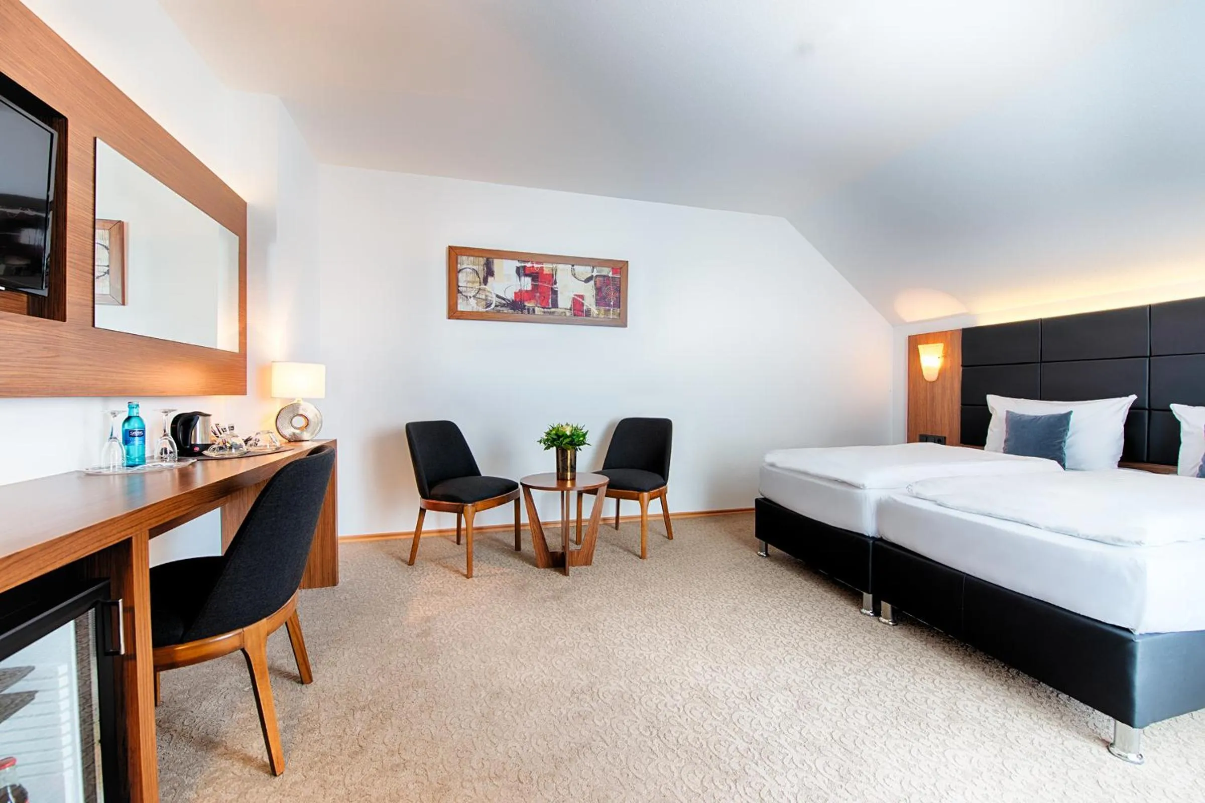 Photo of the whole room, Bed in ACHAT Hotel Bad Dürkheim