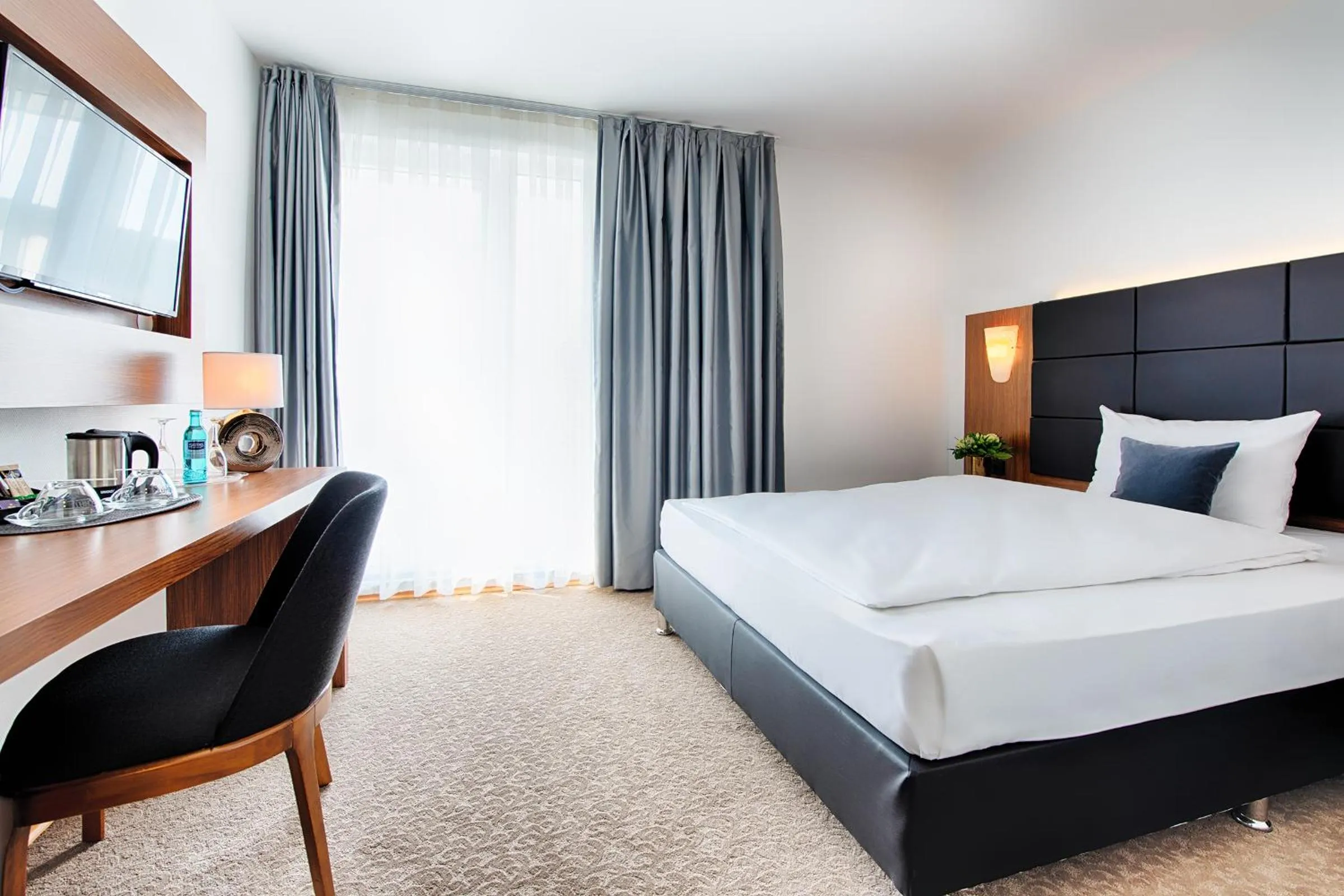 Bed in ACHAT Hotel Bad Dürkheim