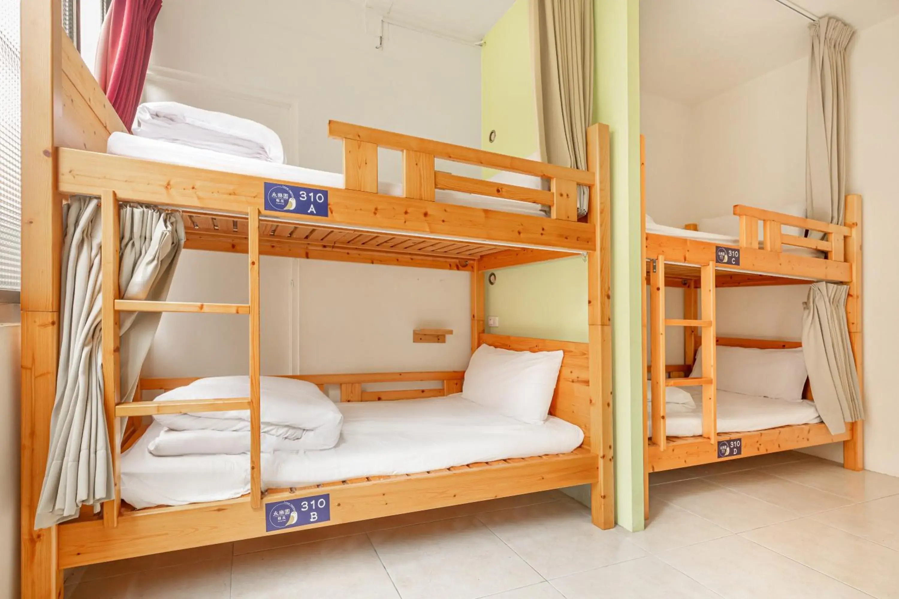 Bed in 4-Bed Female Dormitory Room in Forever Happiness Hostel Bed in 4-Bed Female Dormitory Room in Forever Happiness Hostel