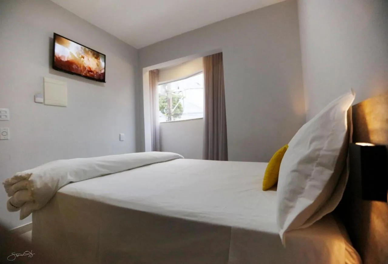 Bed in Aero Inn Hotel