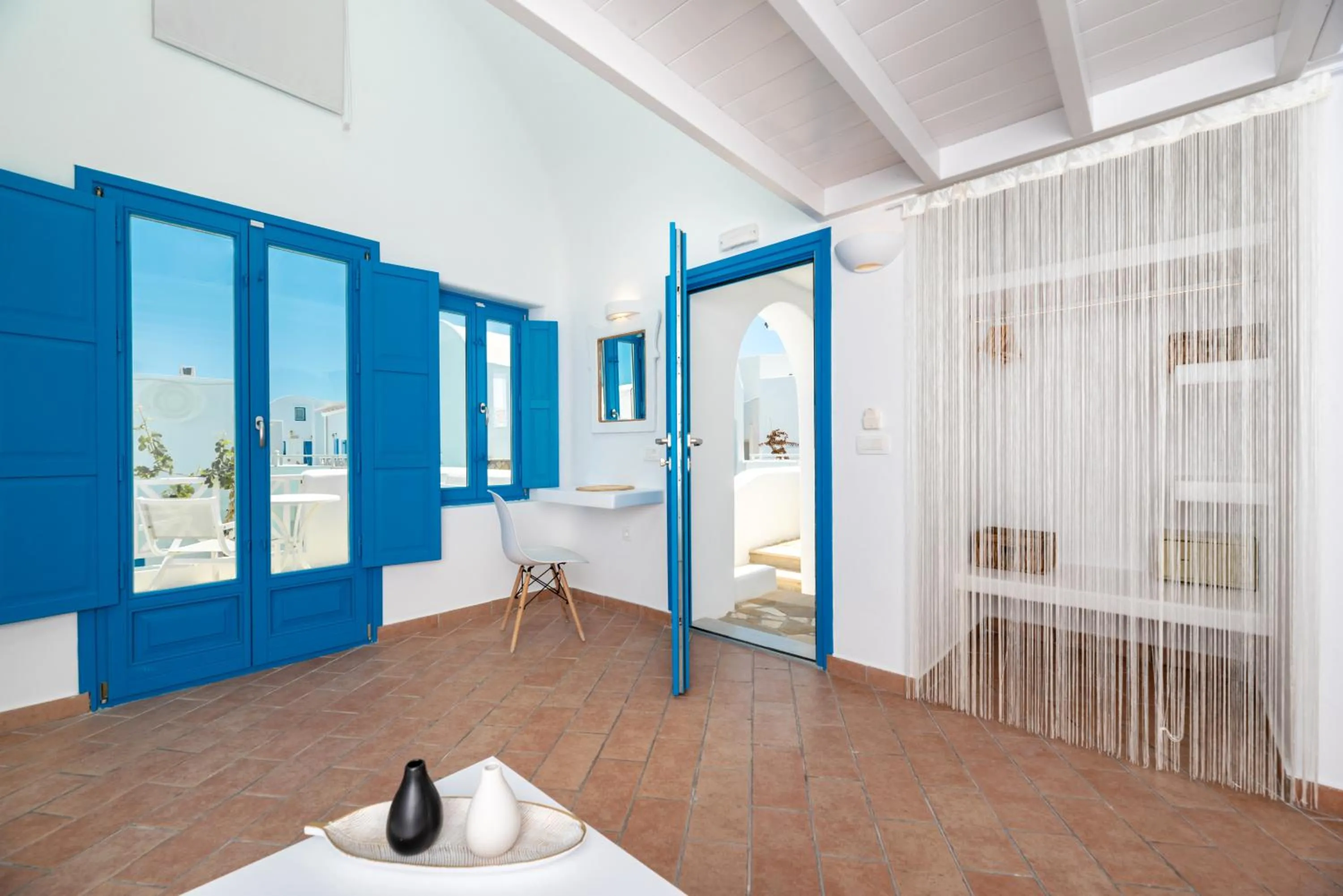 Living room in Seaside by Manos