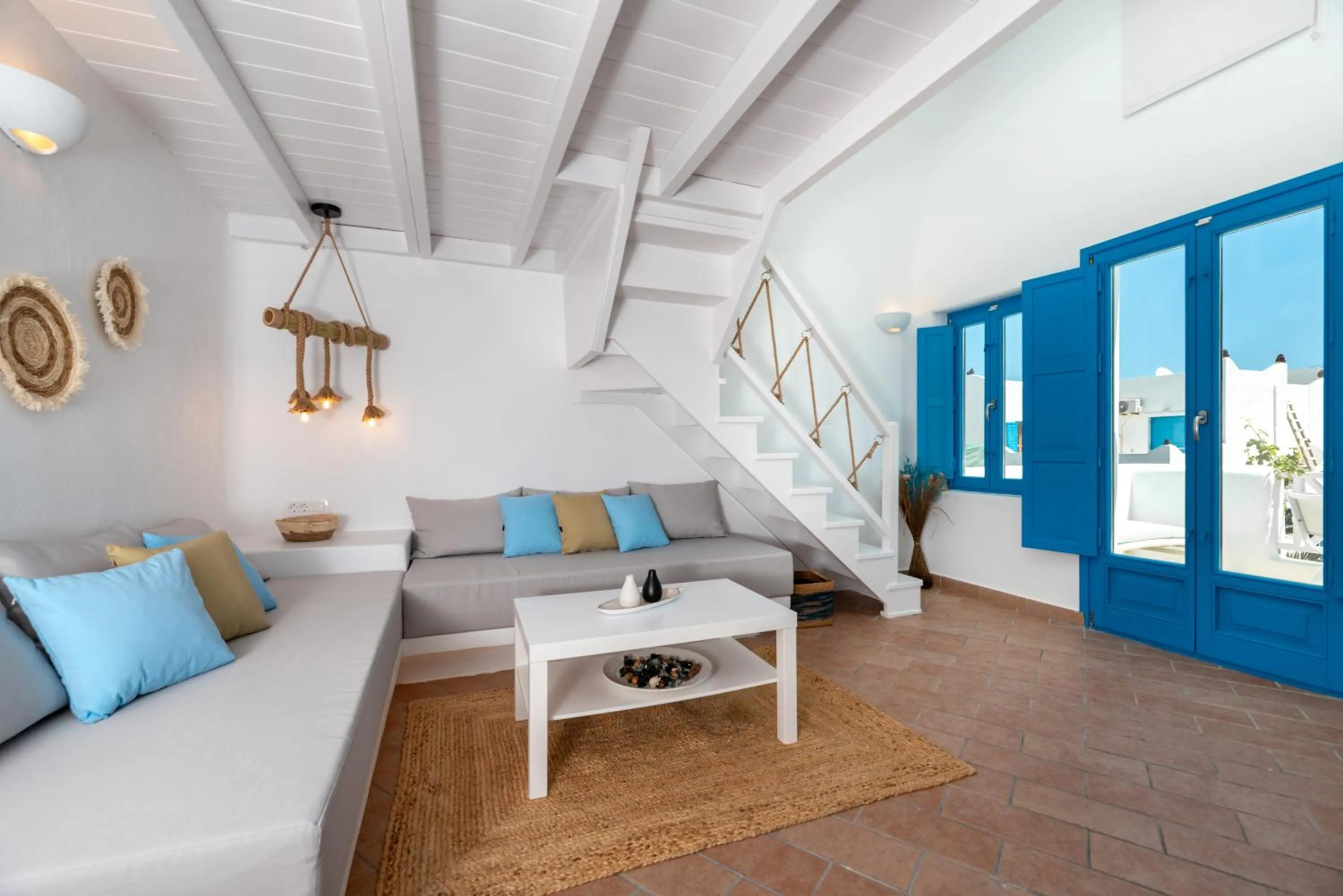 Living room in Seaside by Manos