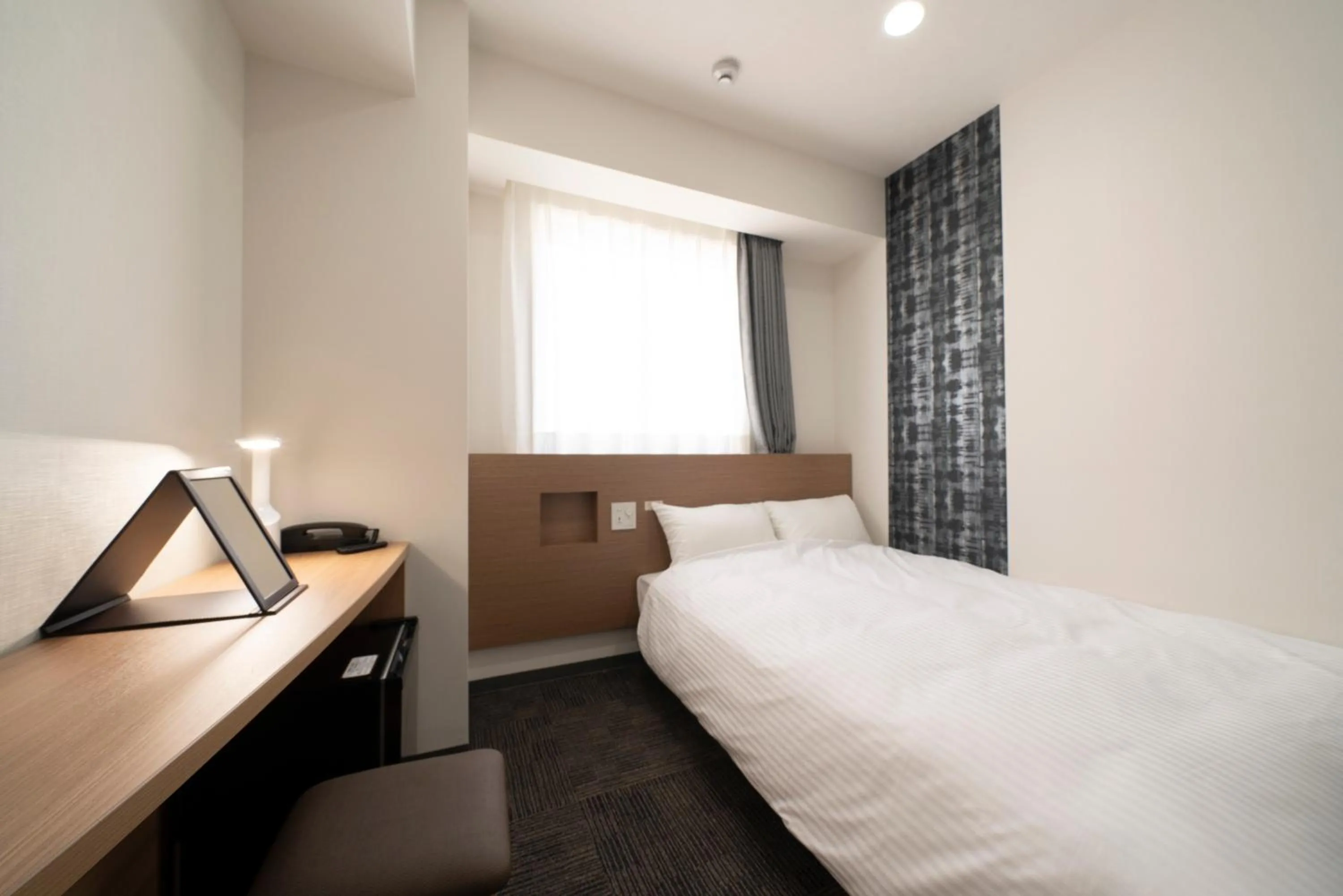 Bed in Washington R&B Hotel Nagoya Ekimae