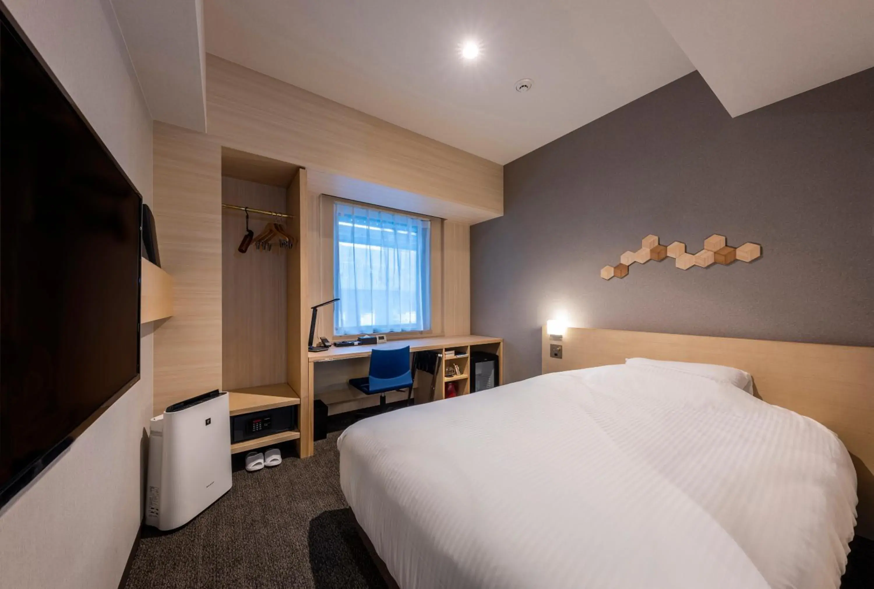 Bed in JR Clement Inn Kochi Bed in JR Clement Inn Kochi