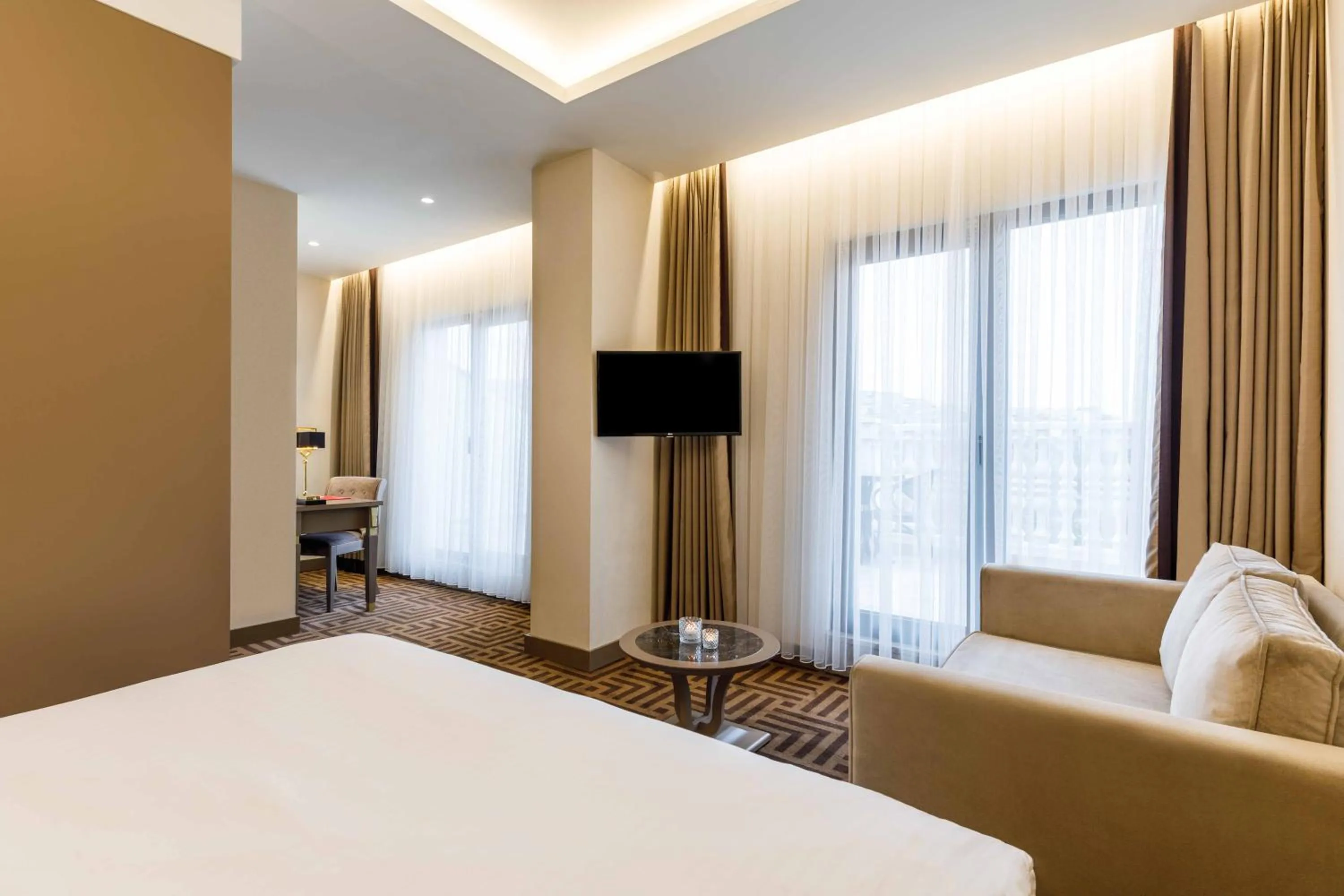 Seating area, Bed in Ramada by Wyndham Istanbul Golden Horn