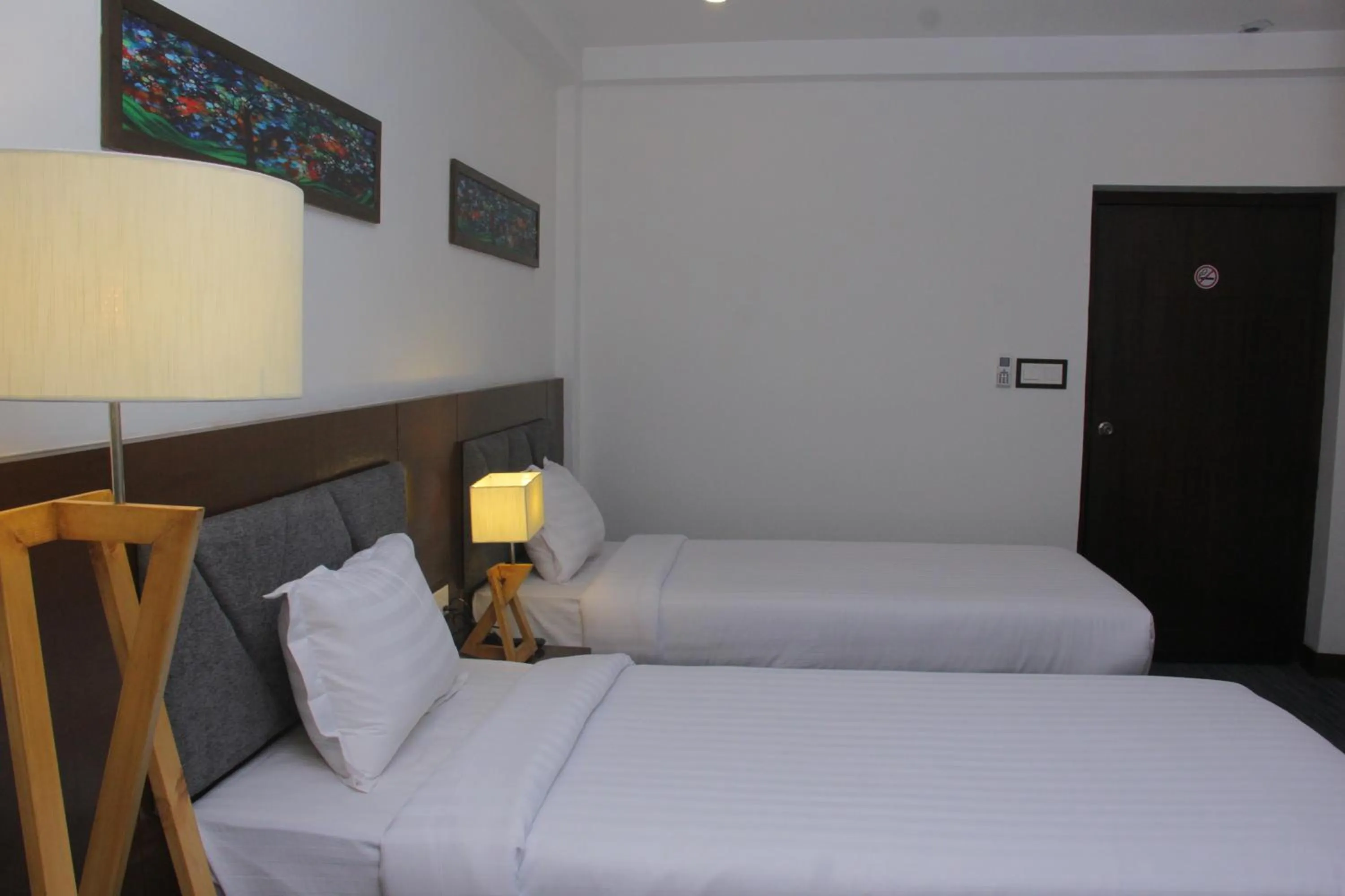 Bed in Hotel Zakaria International