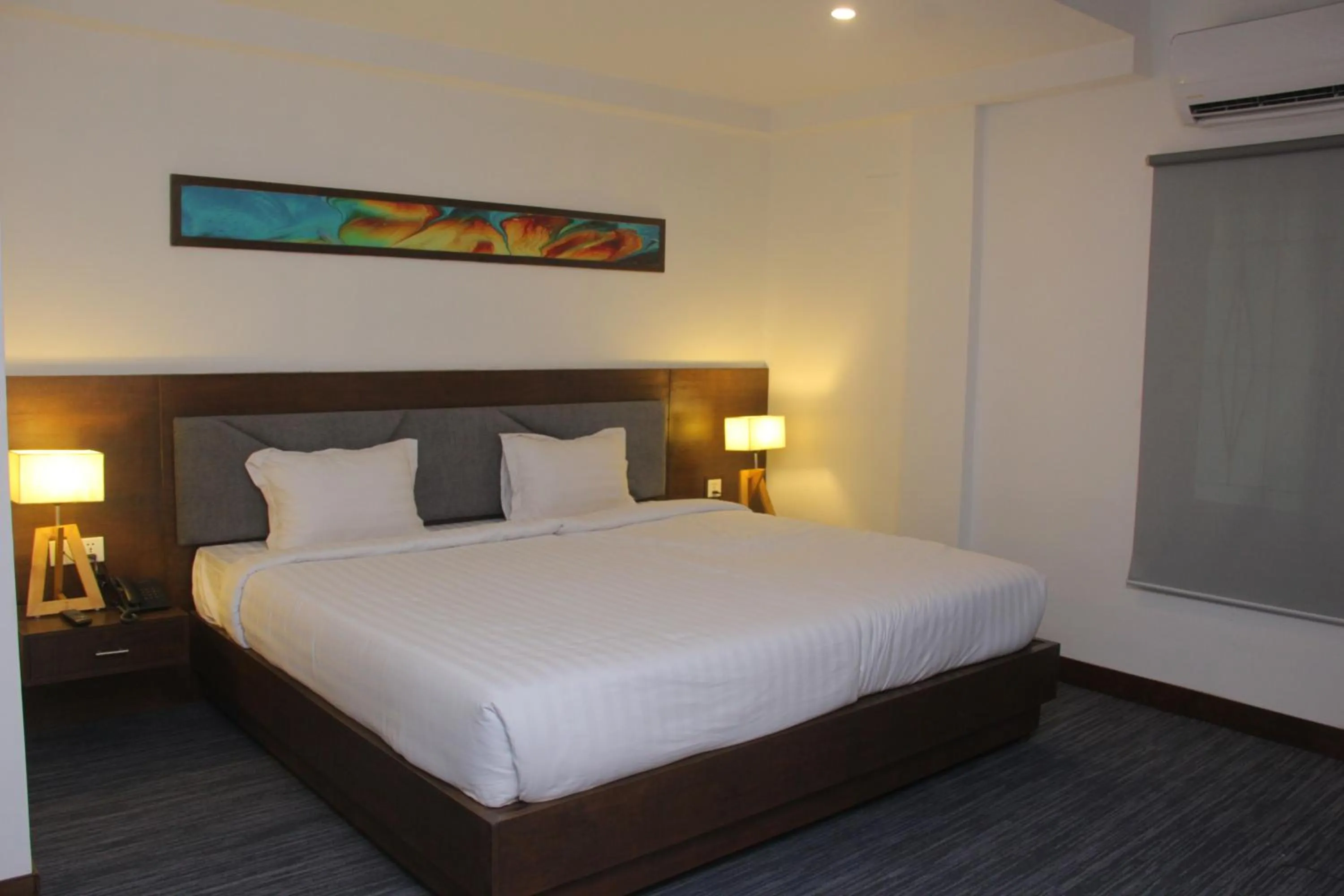 Bed in Hotel Zakaria International