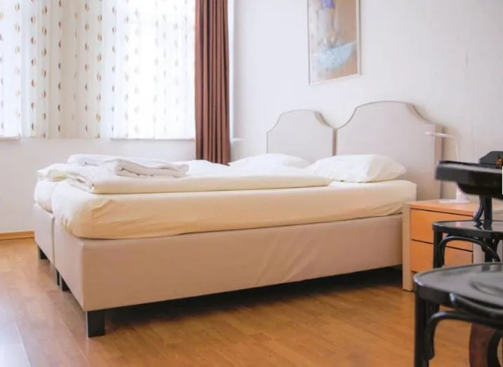 Bed in Hotel Lübecker Hof