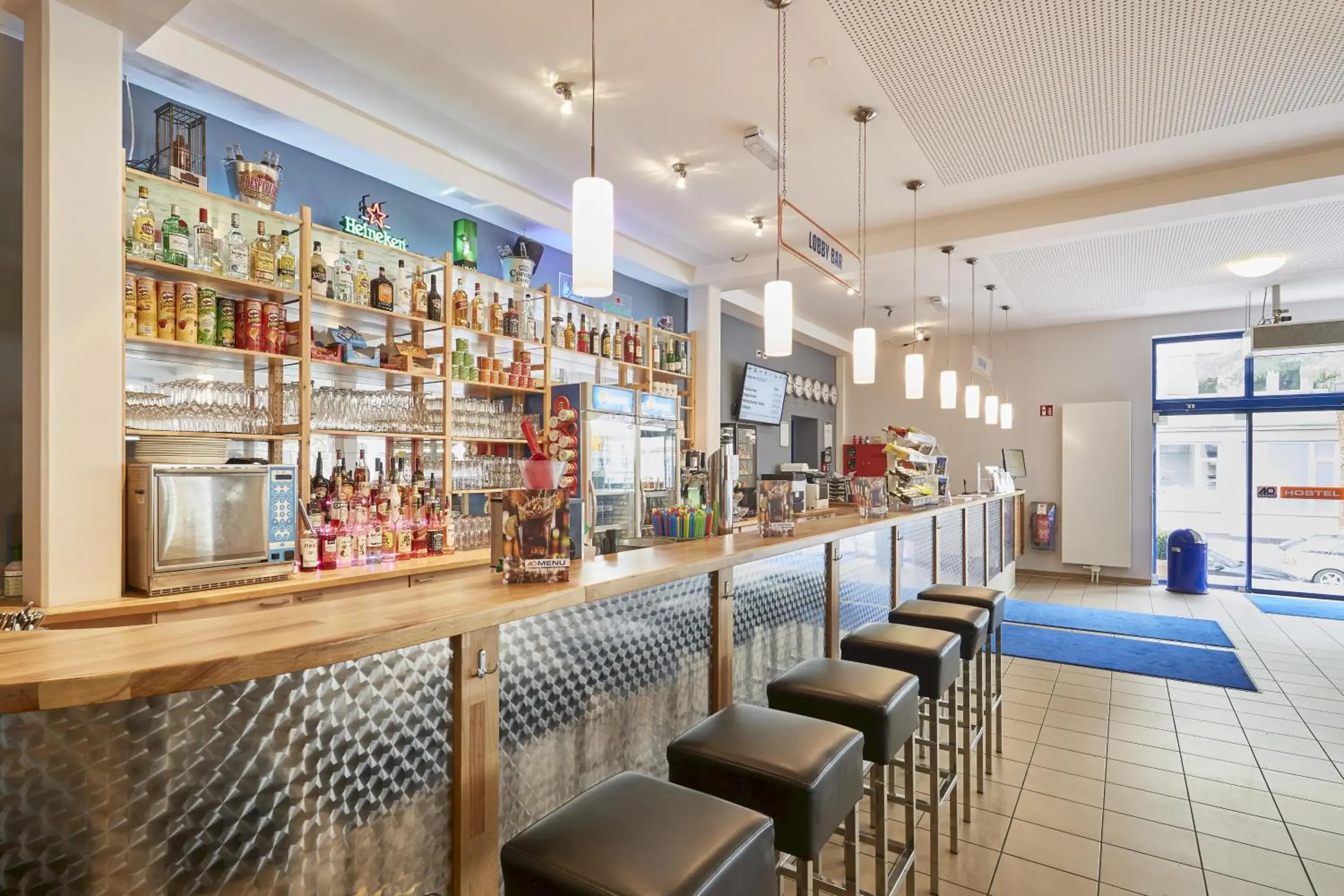 Lounge or bar in a&o Aachen Hauptbahnhof Lounge or bar in a&o Aachen Hauptbahnhof