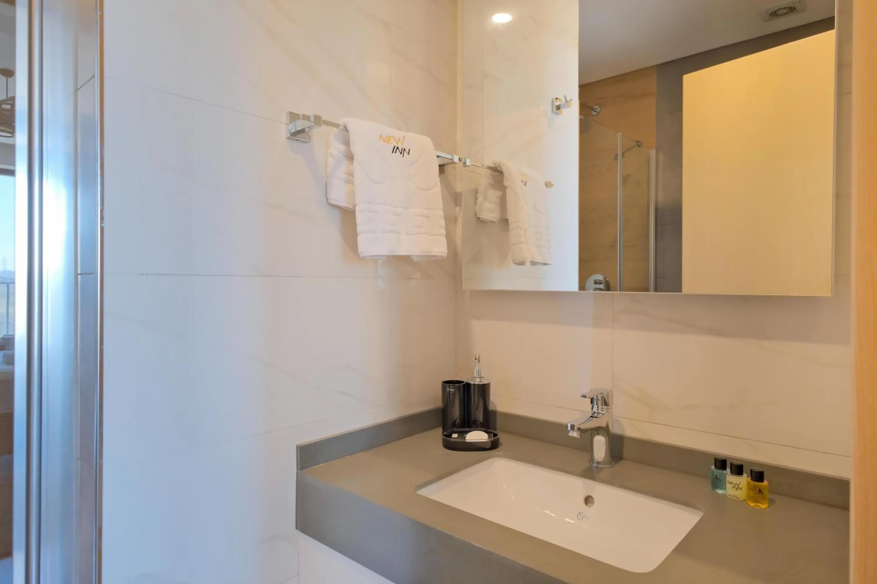 Shower in Grand Residence by NewInn