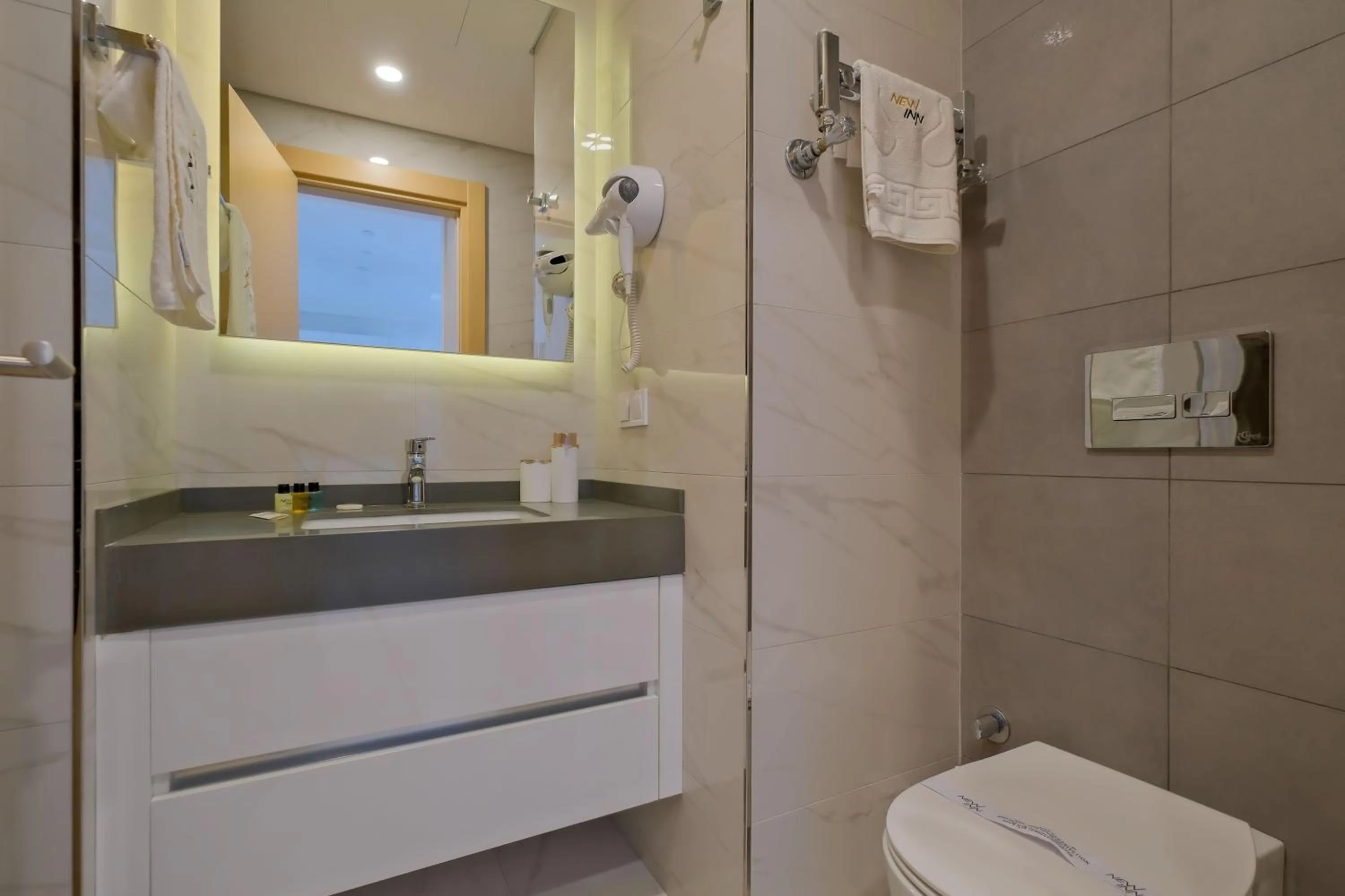 Shower in Grand Residence by NewInn