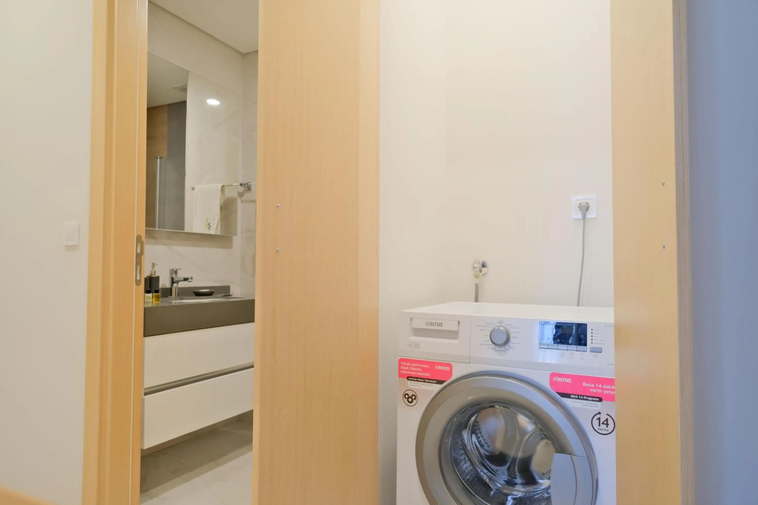 Bathroom in Grand Residence by NewInn