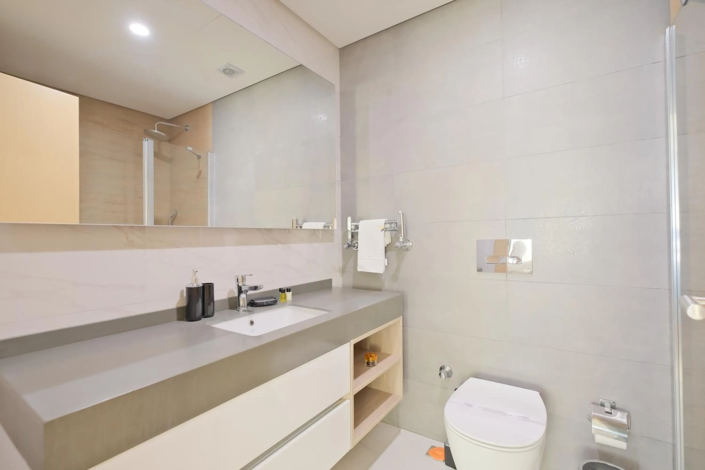 Toilet in Grand Residence by NewInn