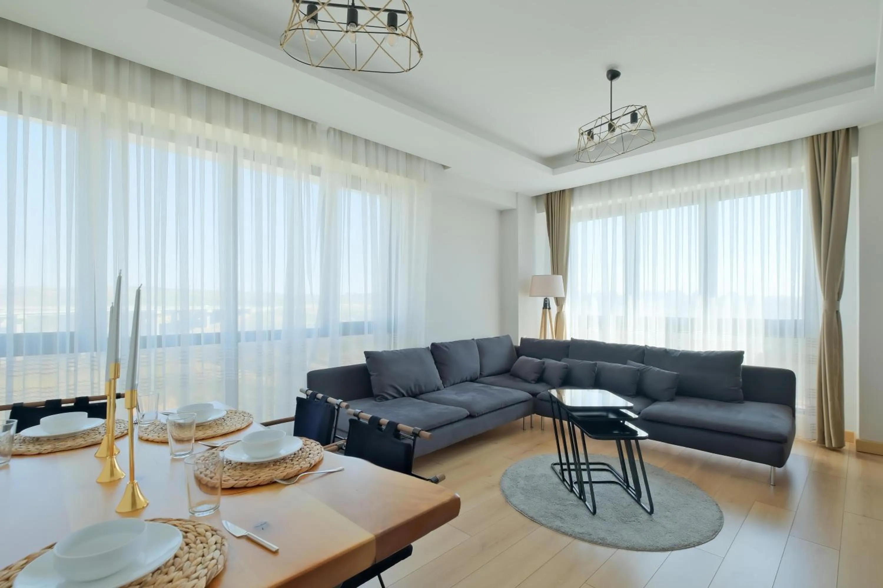 Living room in Grand Residence by NewInn