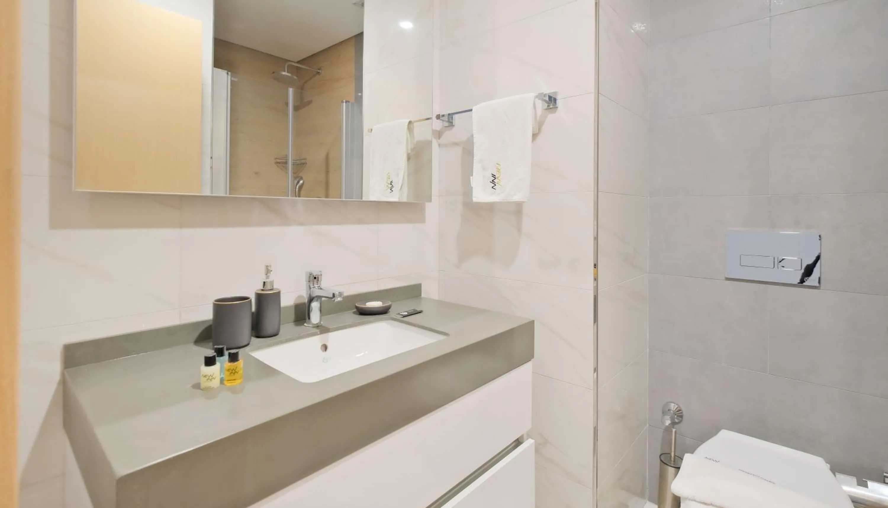 Shower in Grand Residence by NewInn