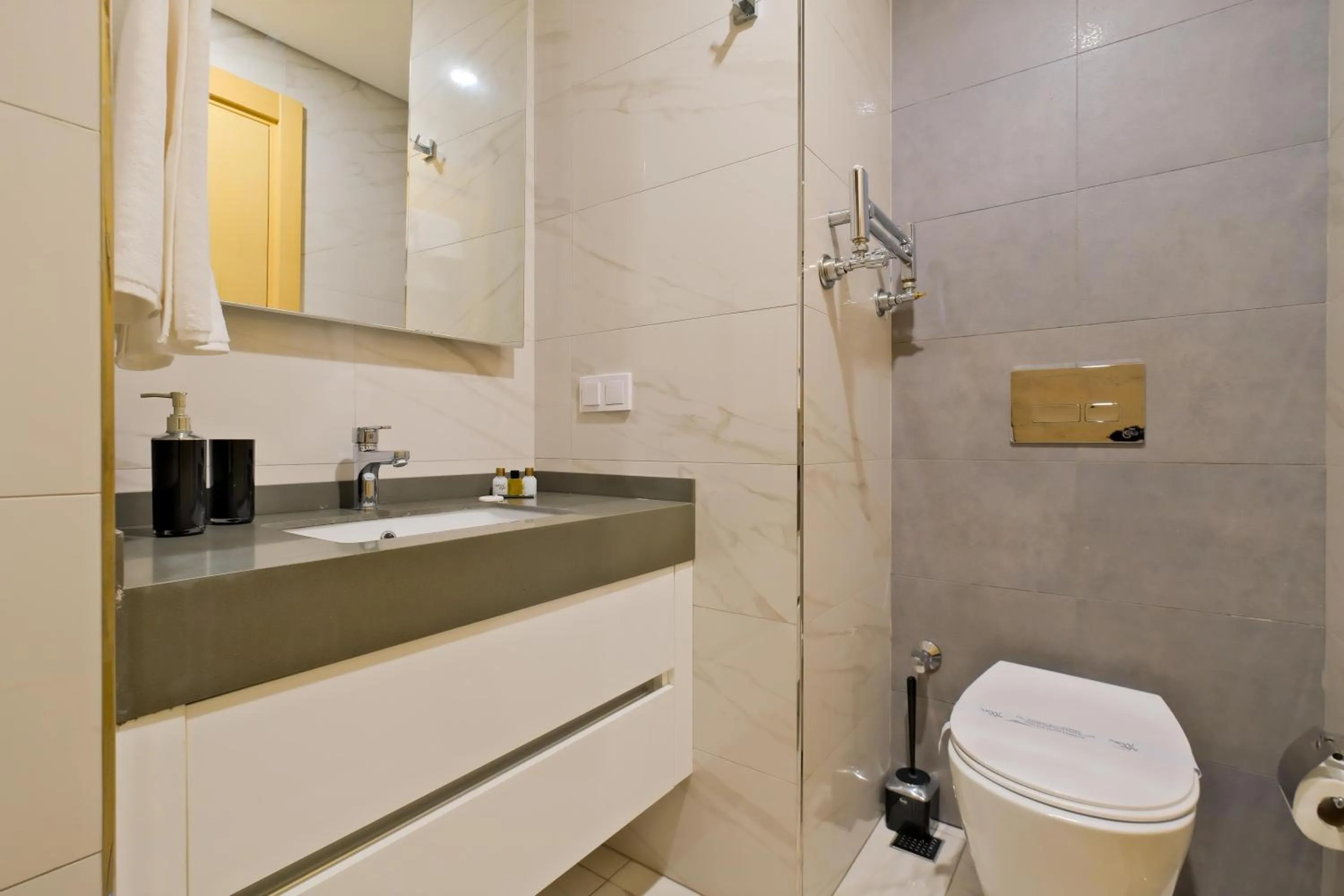 Shower in Grand Residence by NewInn