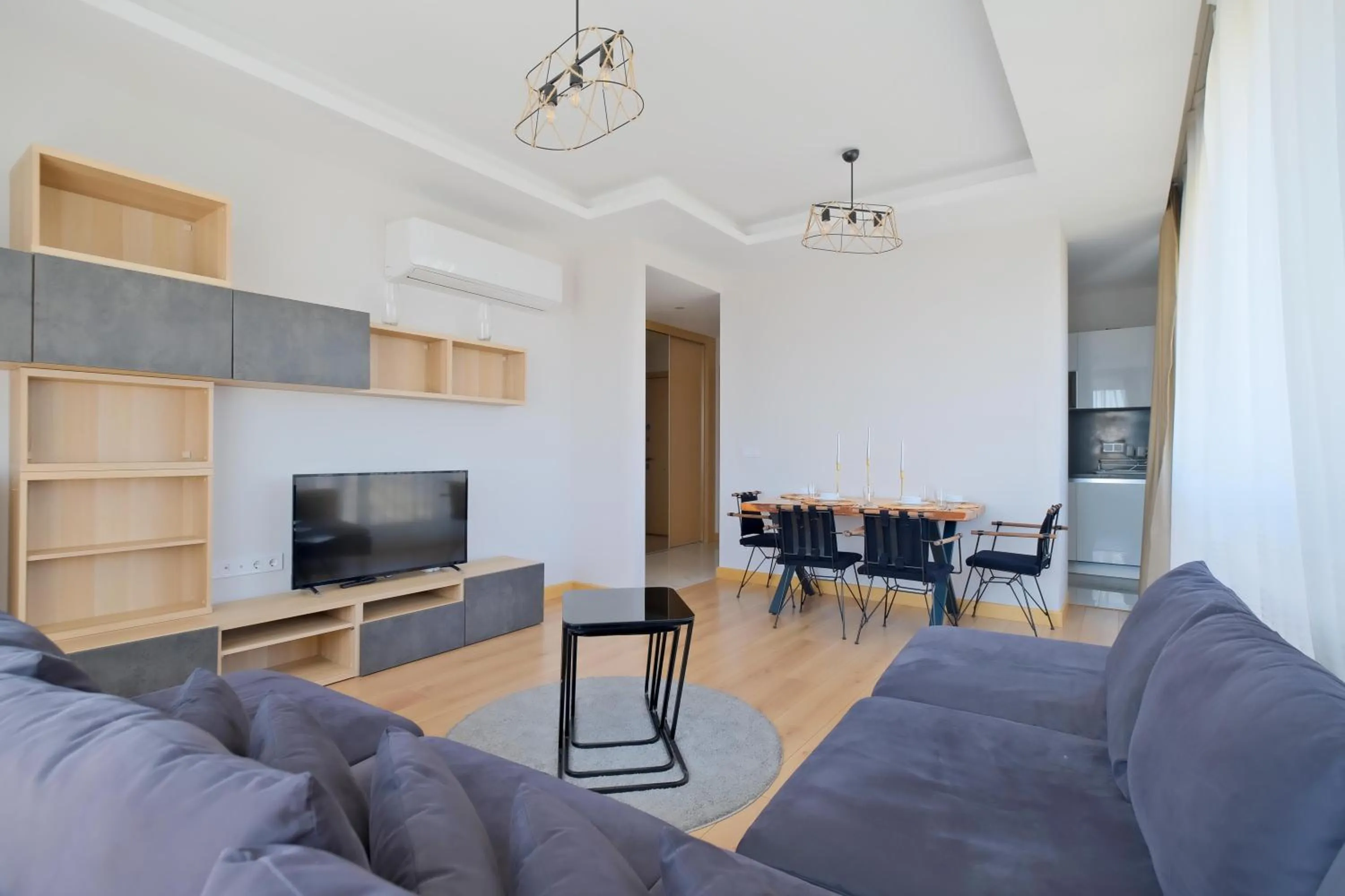 Communal lounge/ TV room in Grand Residence by NewInn