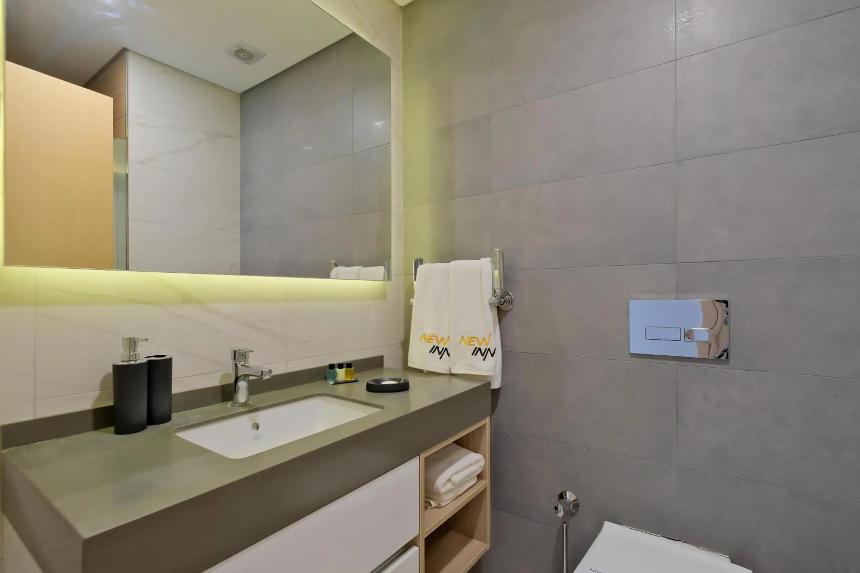 Toilet in Grand Residence by NewInn