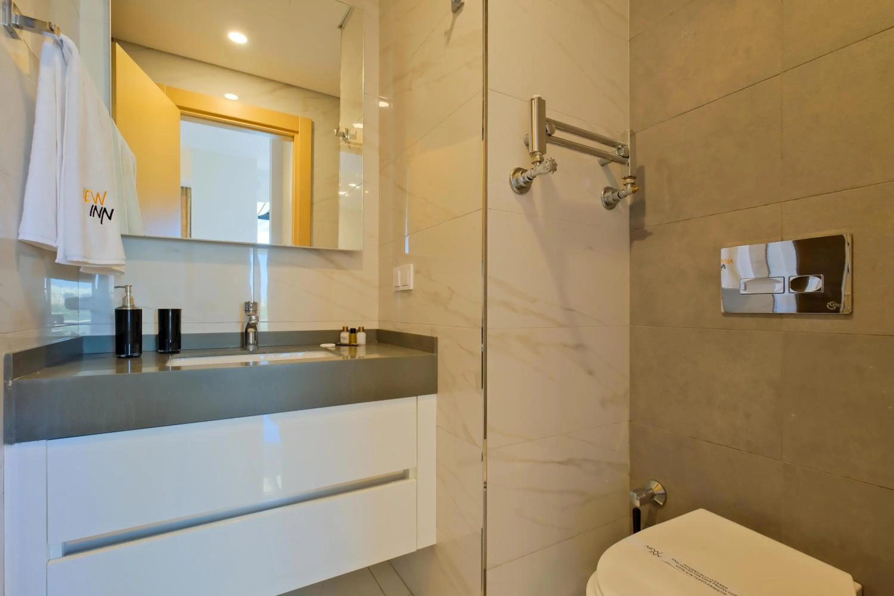 Shower in Grand Residence by NewInn