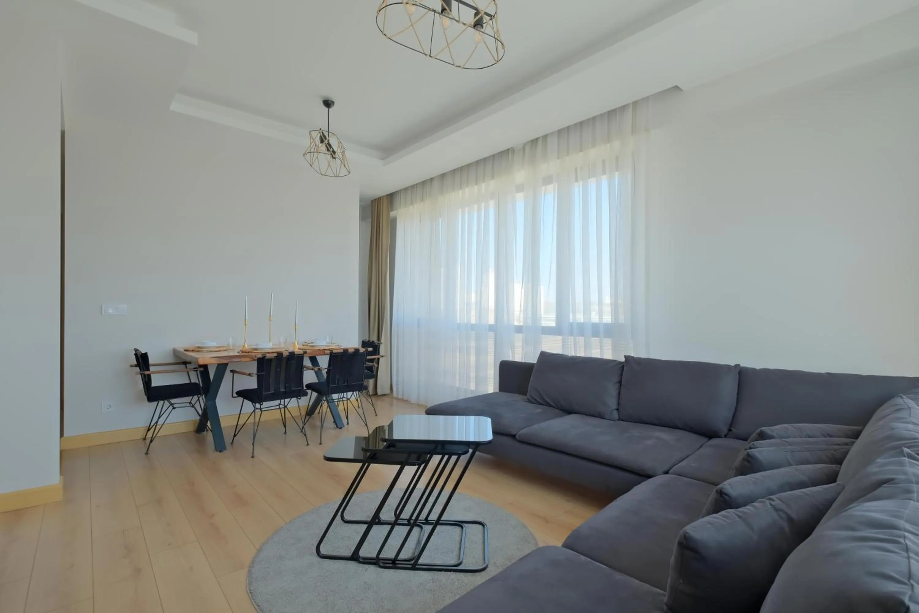 Living room in Grand Residence by NewInn