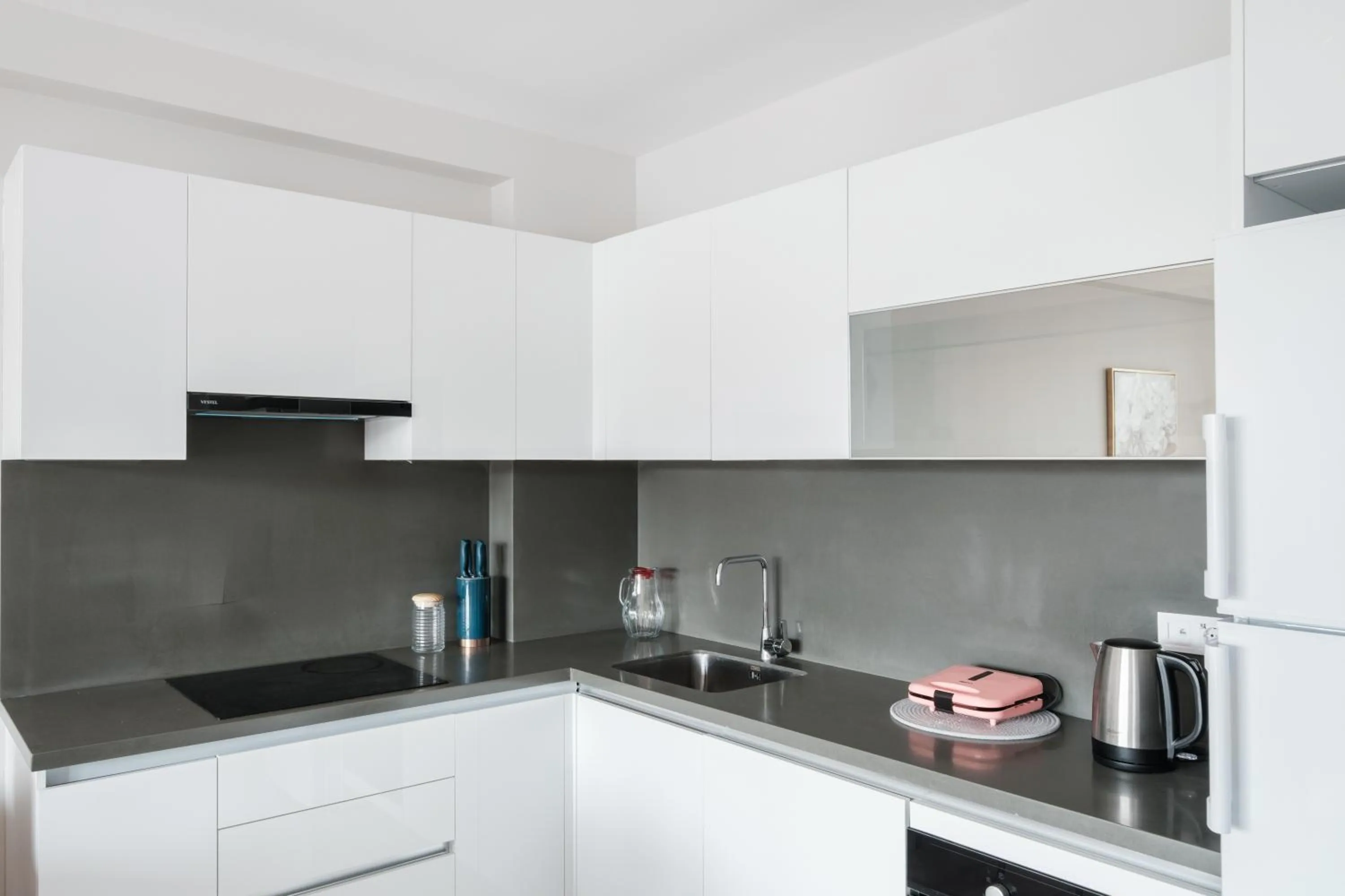 kitchen in Grand Residence by NewInn