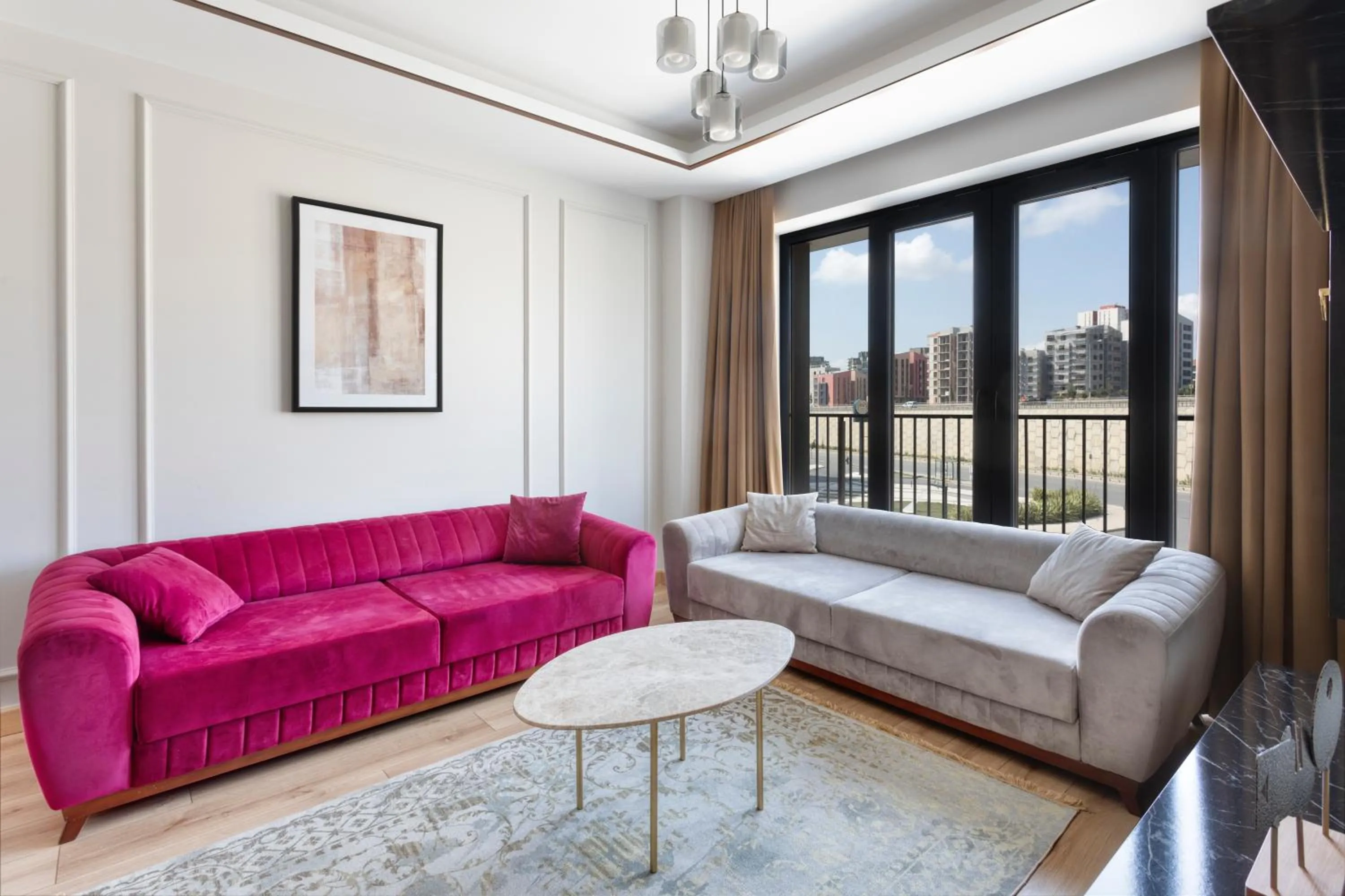 Living room in Grand Residence by NewInn