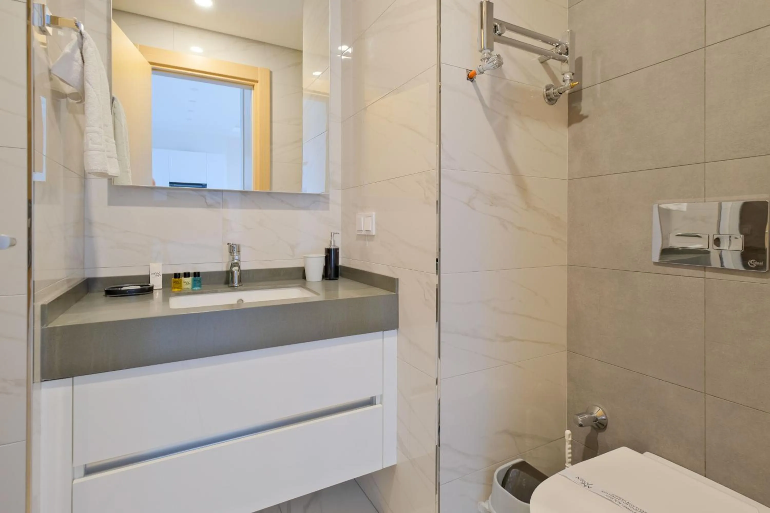 Shower in Grand Residence by NewInn