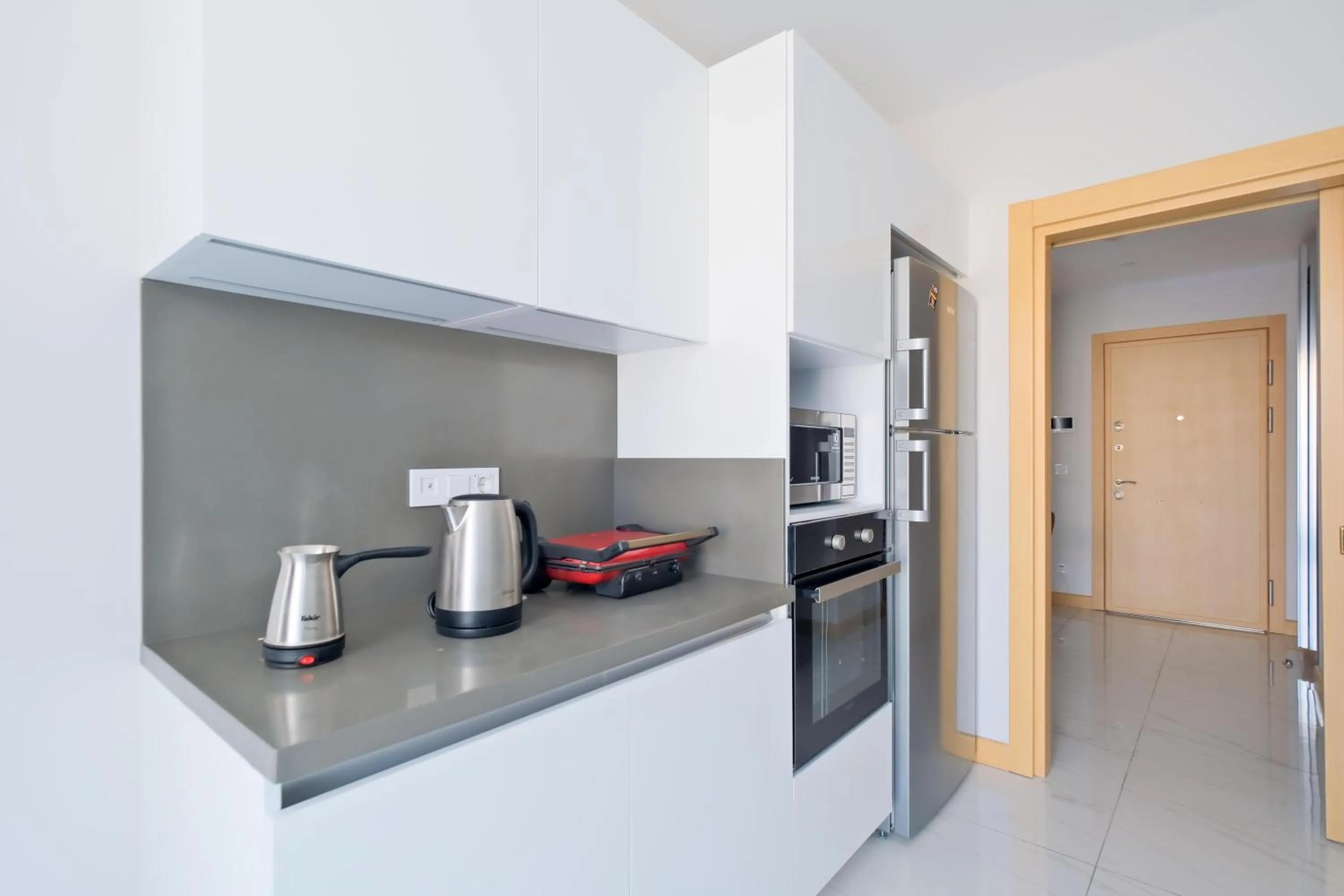 Kitchen or kitchenette in Grand Residence by NewInn