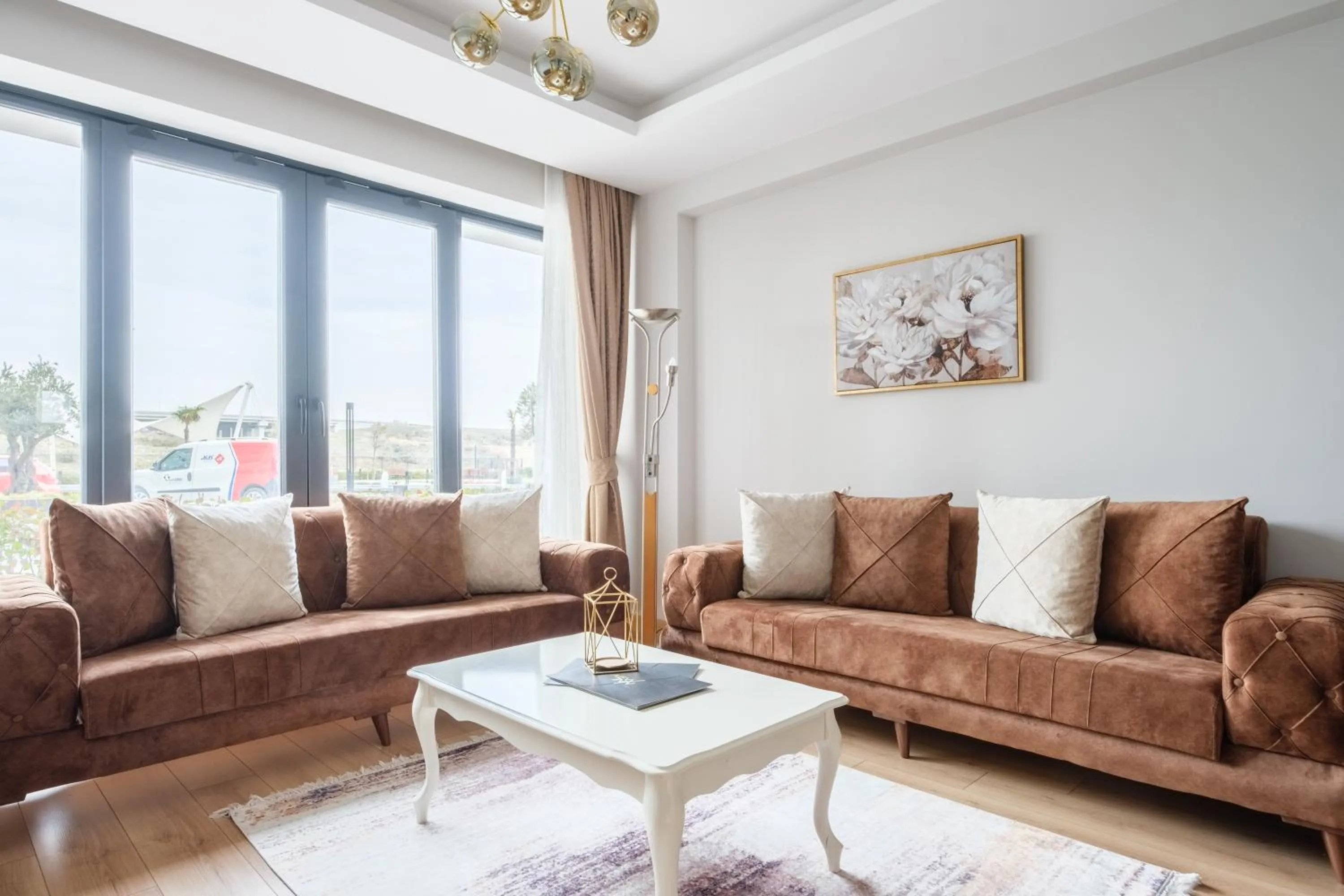 Seating area in Grand Residence by NewInn