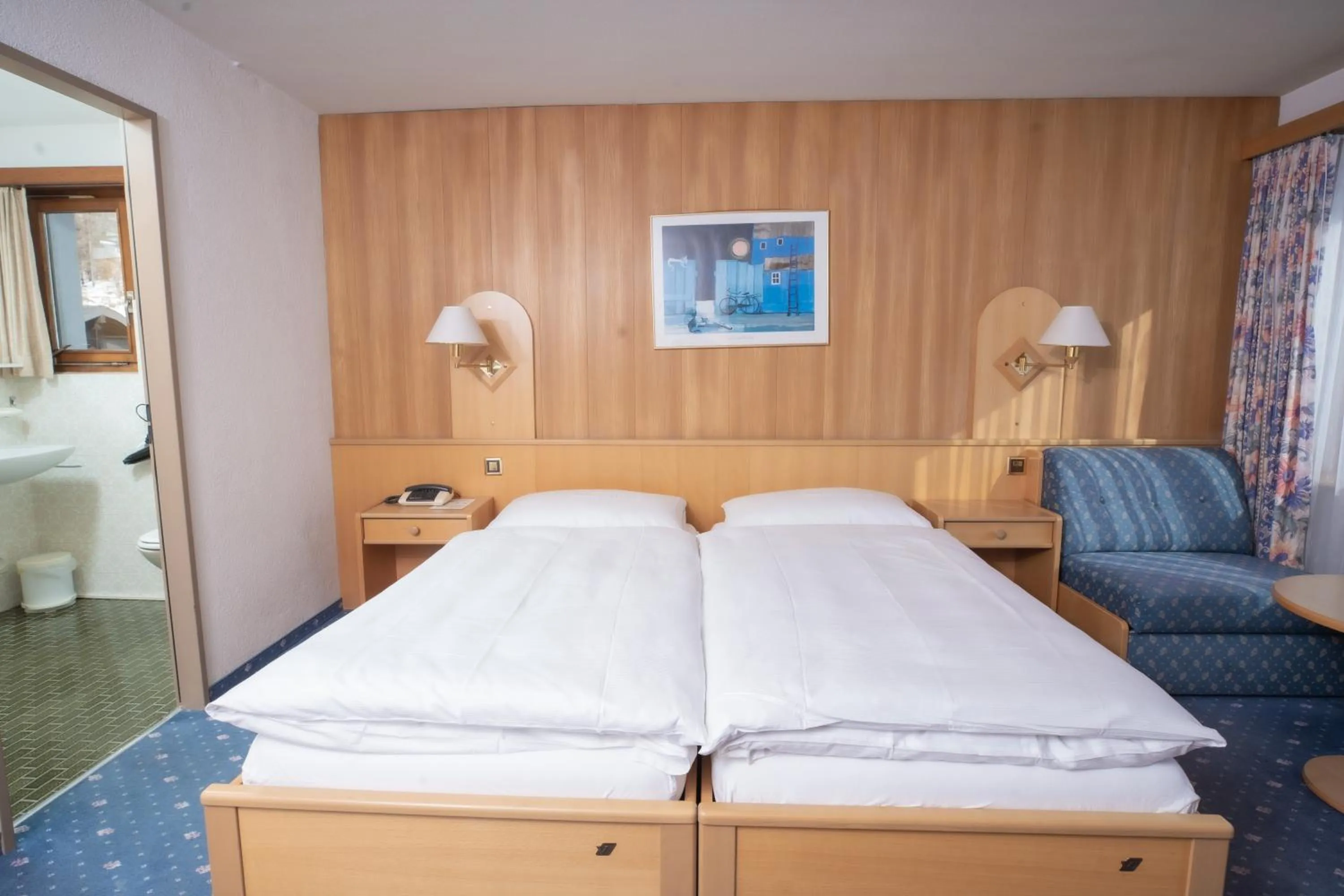 Bed in Hotel Alpenhof