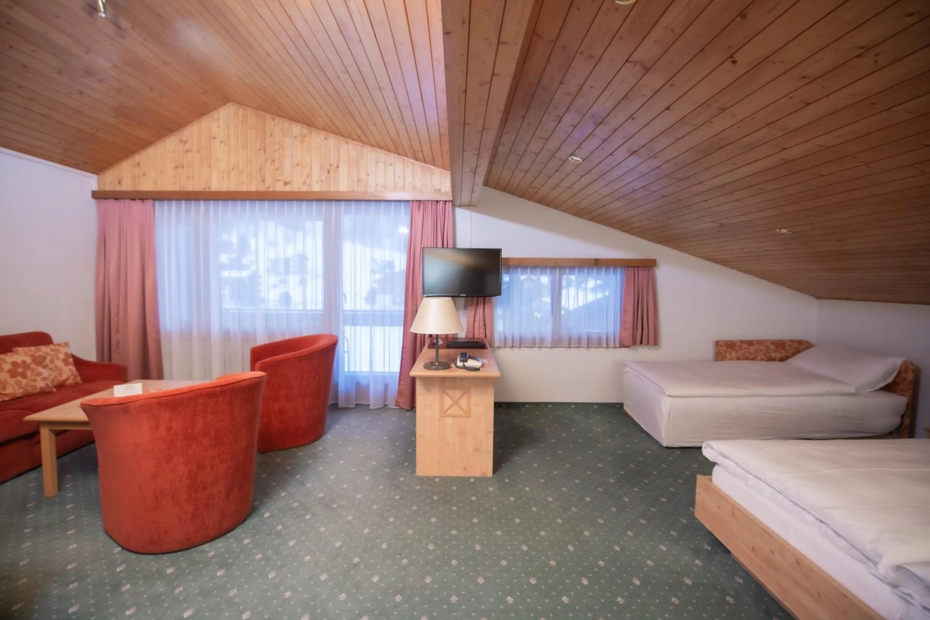 Bed in Hotel Alpenhof