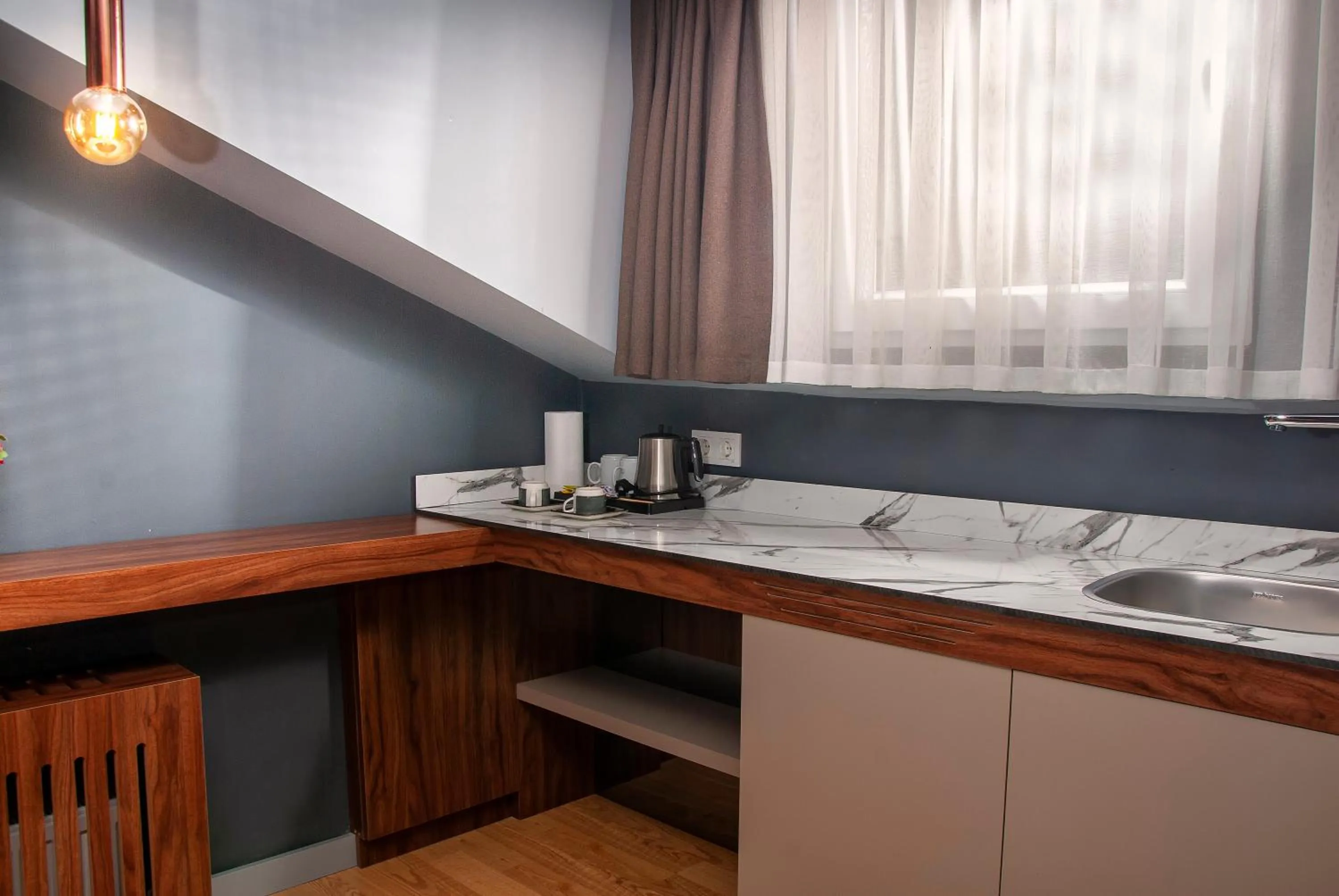 Kitchen or kitchenette in Vitabella Suites