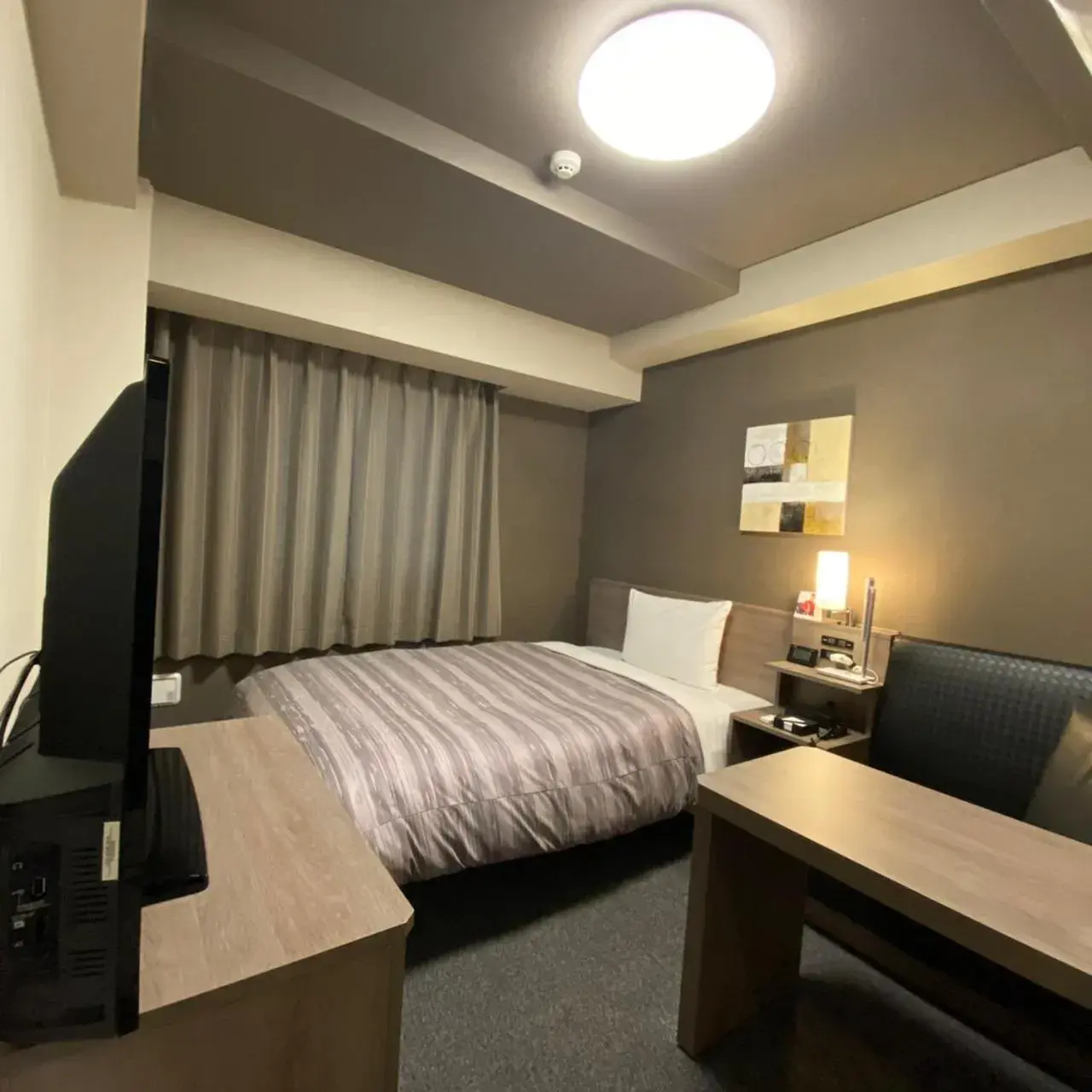 Bed in Route Inn Grantia Tokai Spa&Relaxation Bed in Route Inn Grantia Tokai Spa&Relaxation