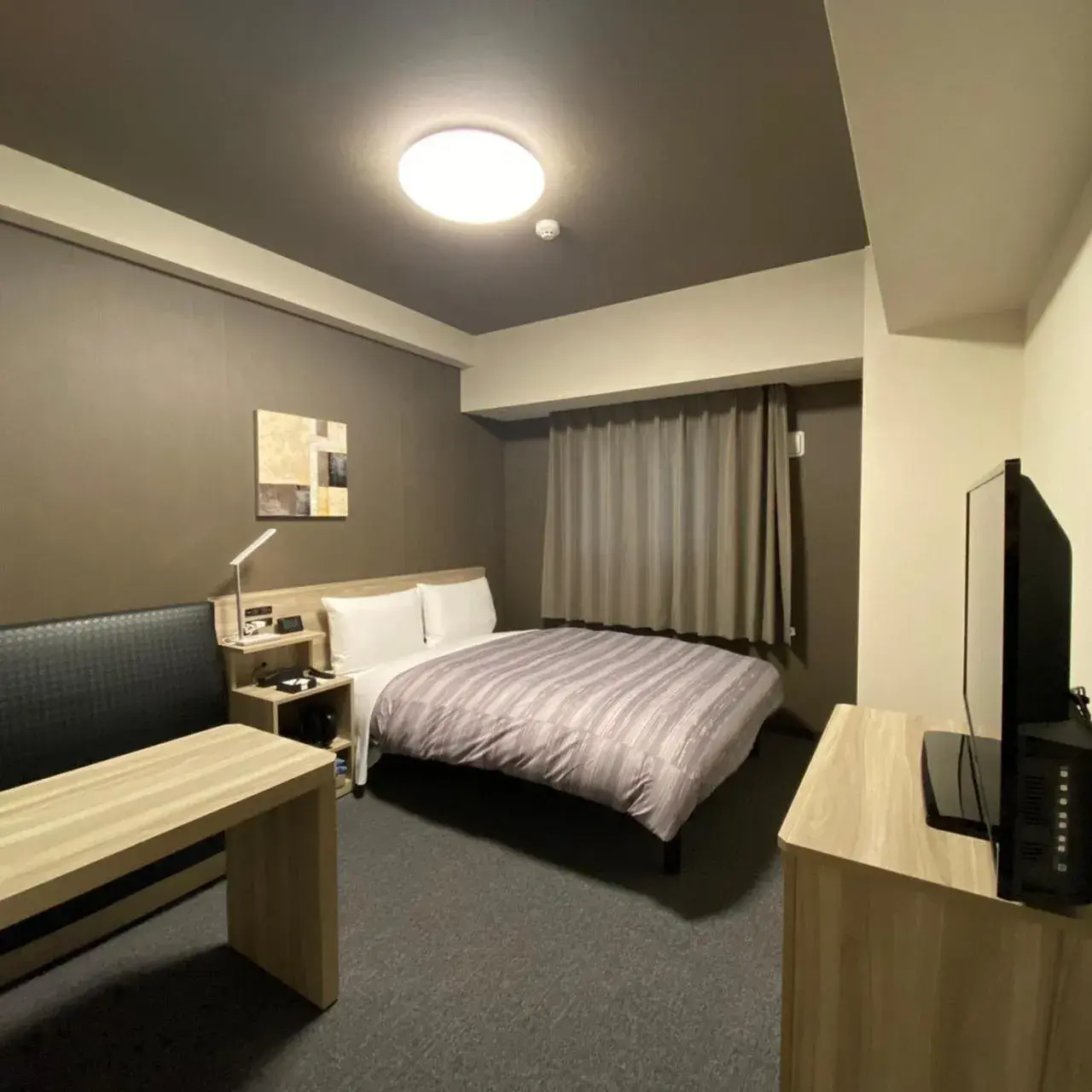 Bed in Route Inn Grantia Tokai Spa&Relaxation Bed in Route Inn Grantia Tokai Spa&Relaxation