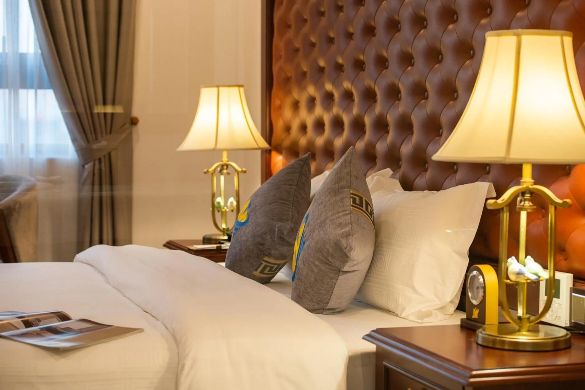 Bed in THE SHINE HOTEL