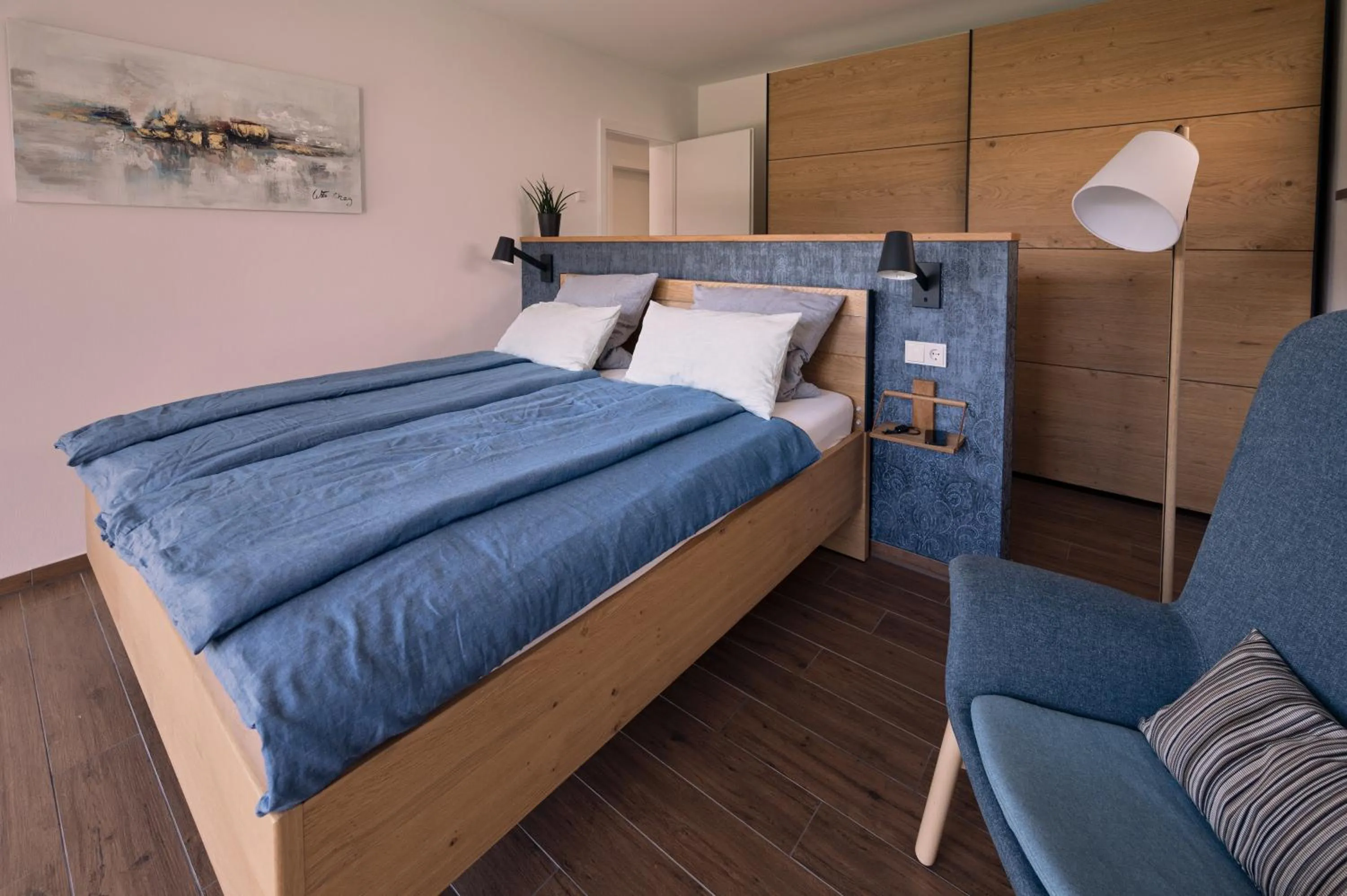 Bed in BLEIBE VIER Ferienwohnungen