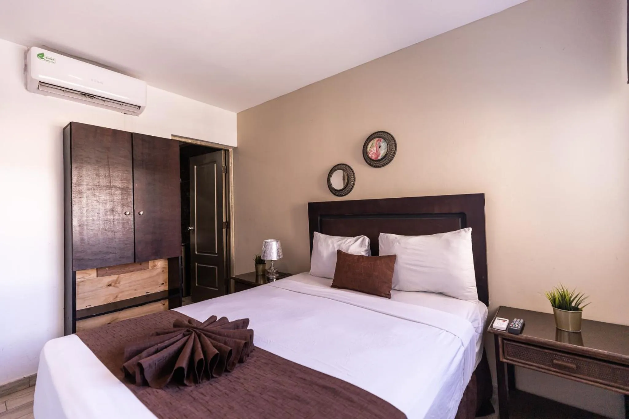 air conditioner, Bed in Hotel Las Rosas de Punta Cana
