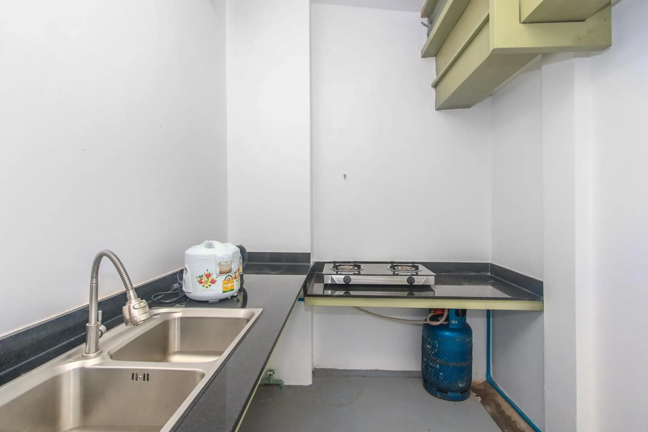 Kitchen or kitchenette in Phan NaTa Apartment