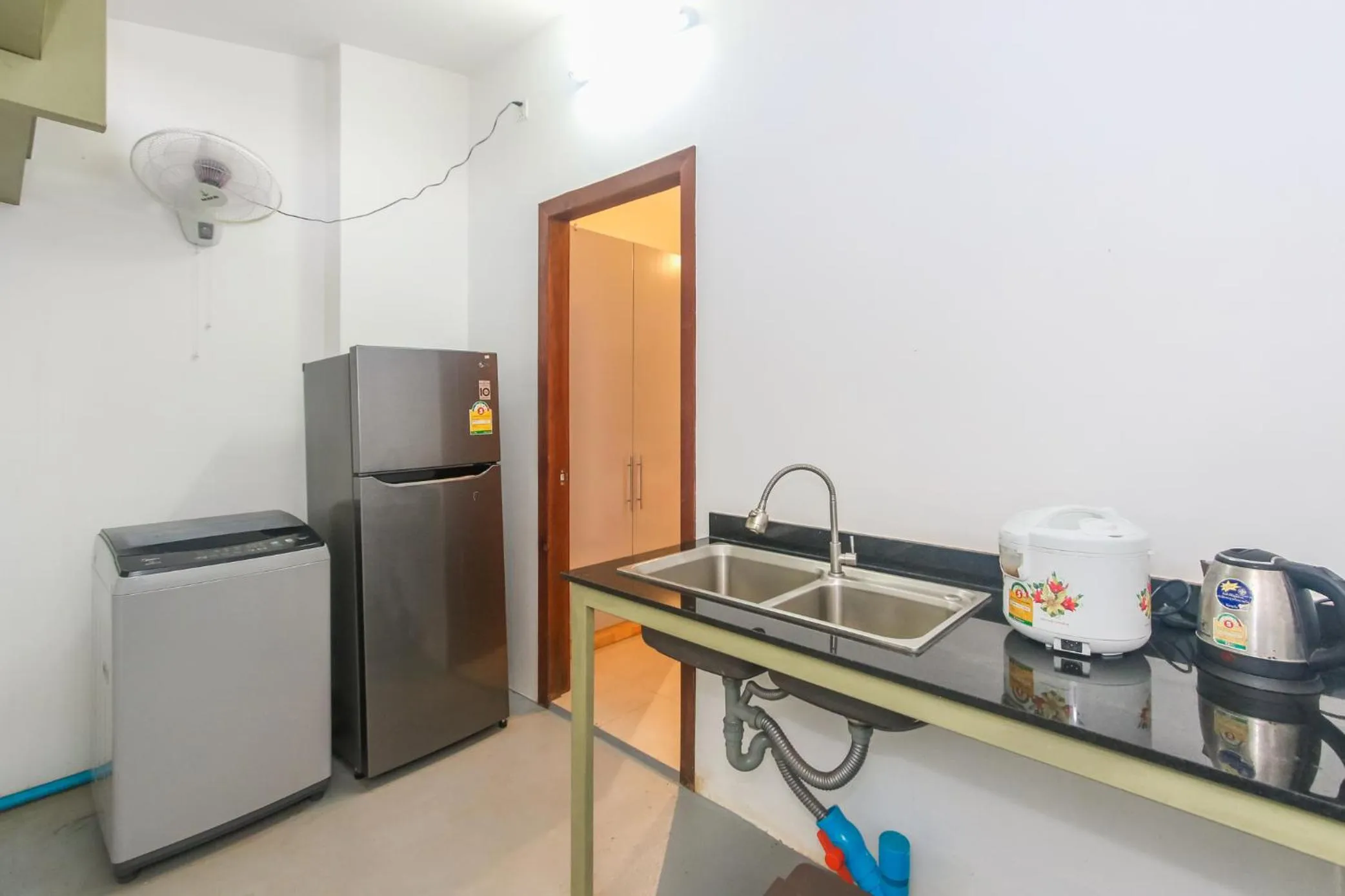 Kitchen or kitchenette in Phan NaTa Apartment