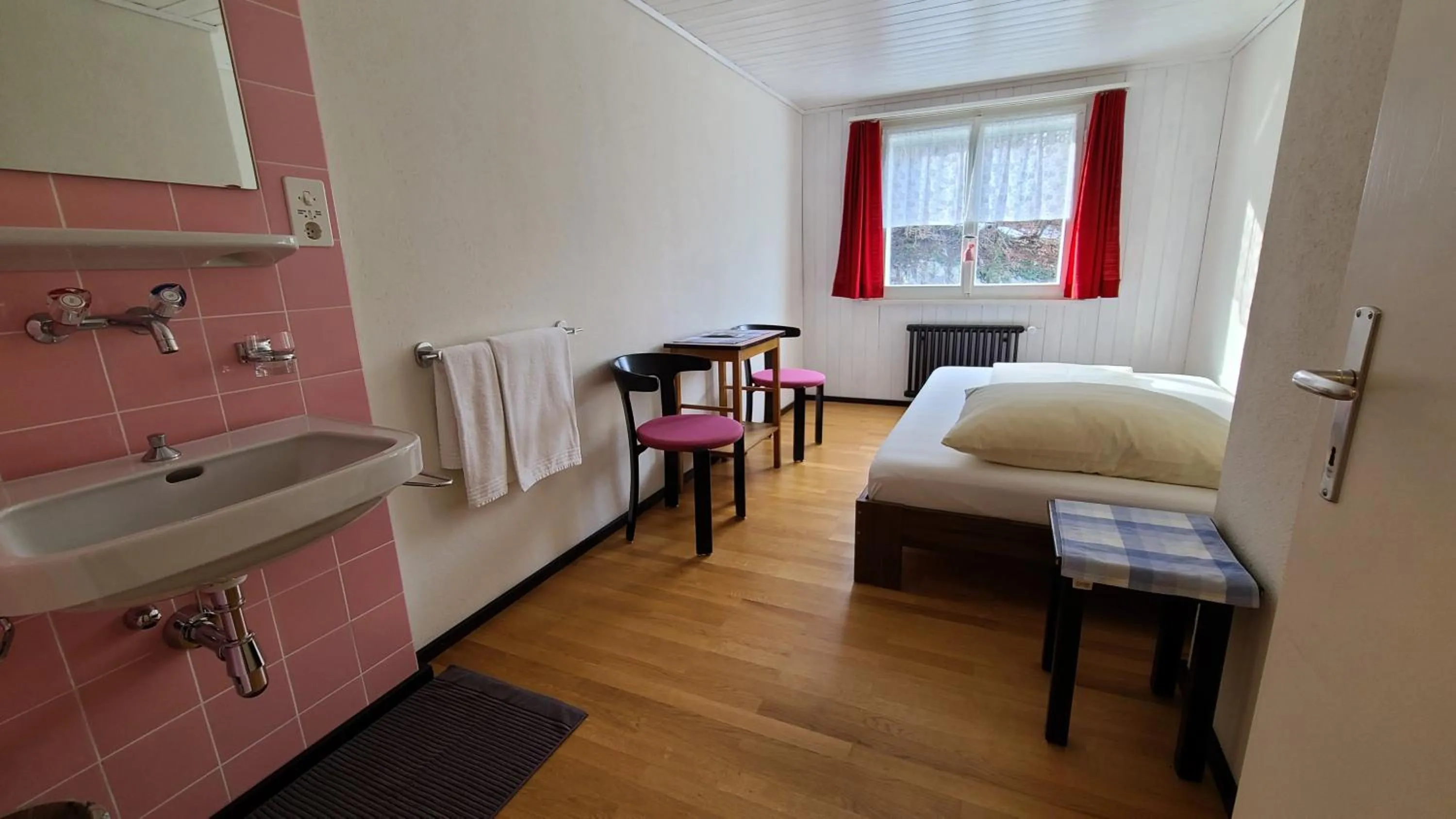 Seating area, Bed in Hotel Cafe Seeblick