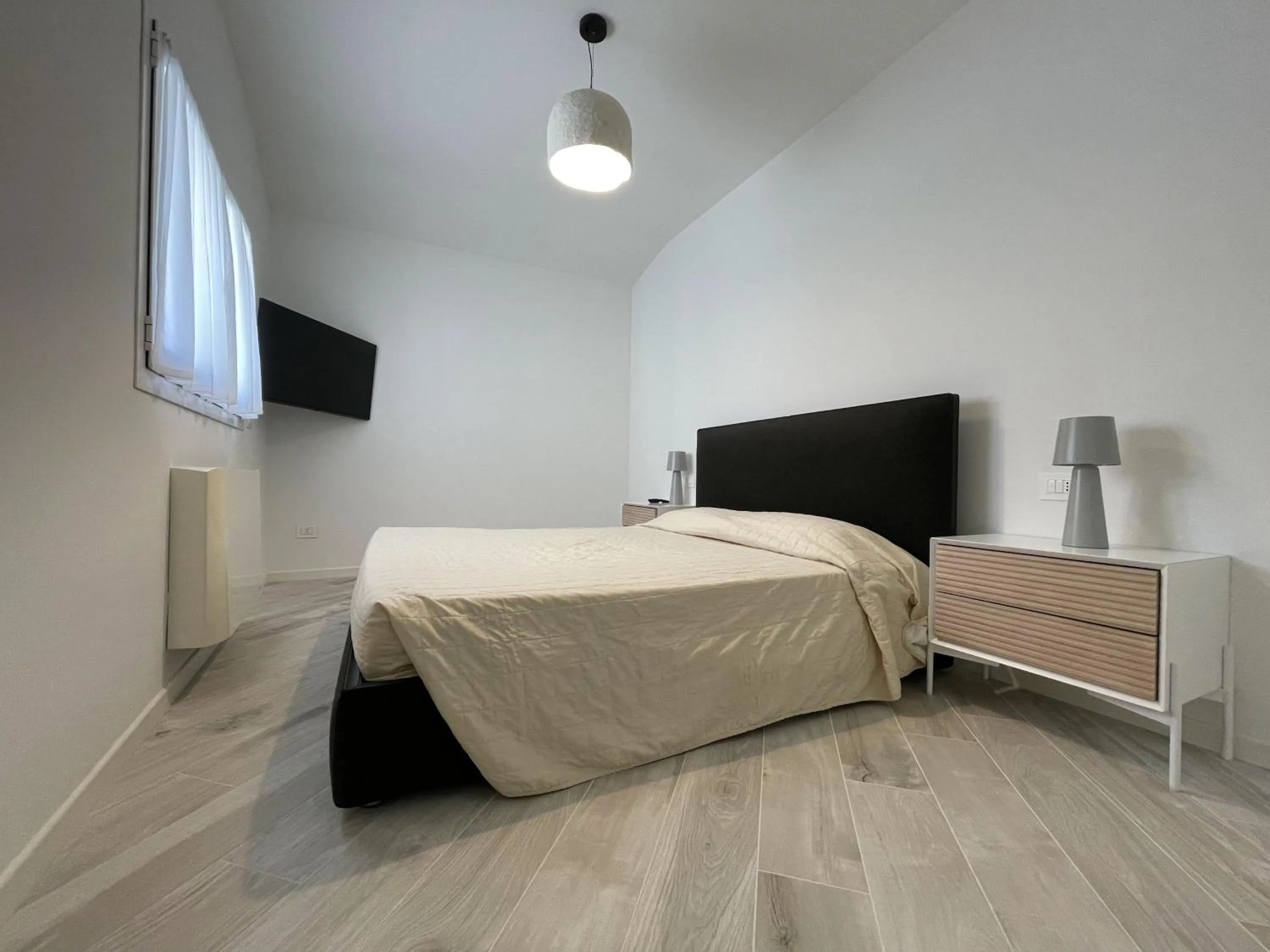 Bed in Gli Scogli Luxury Residence Hotel