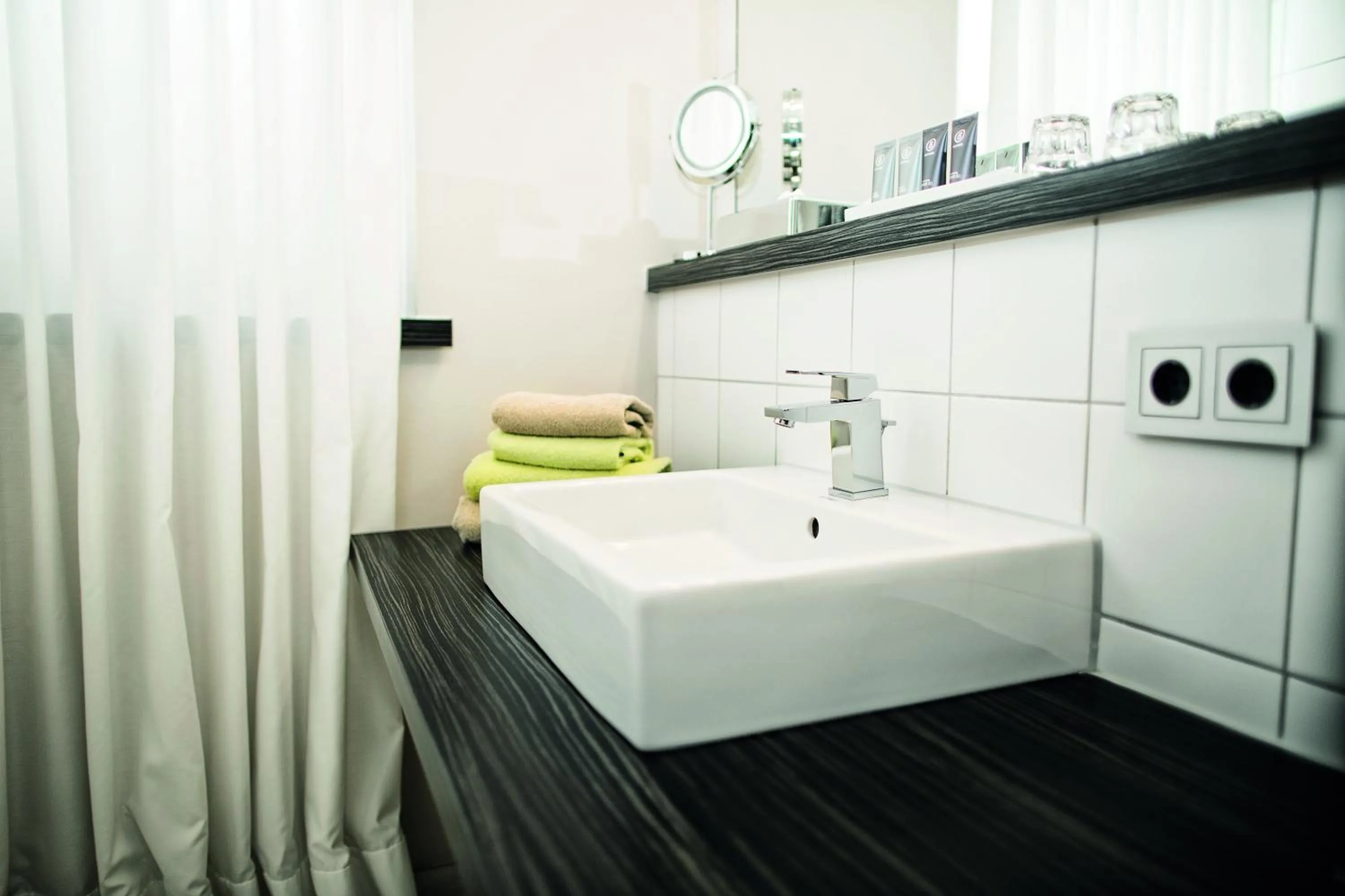 Bathroom in City Hotel Bosse