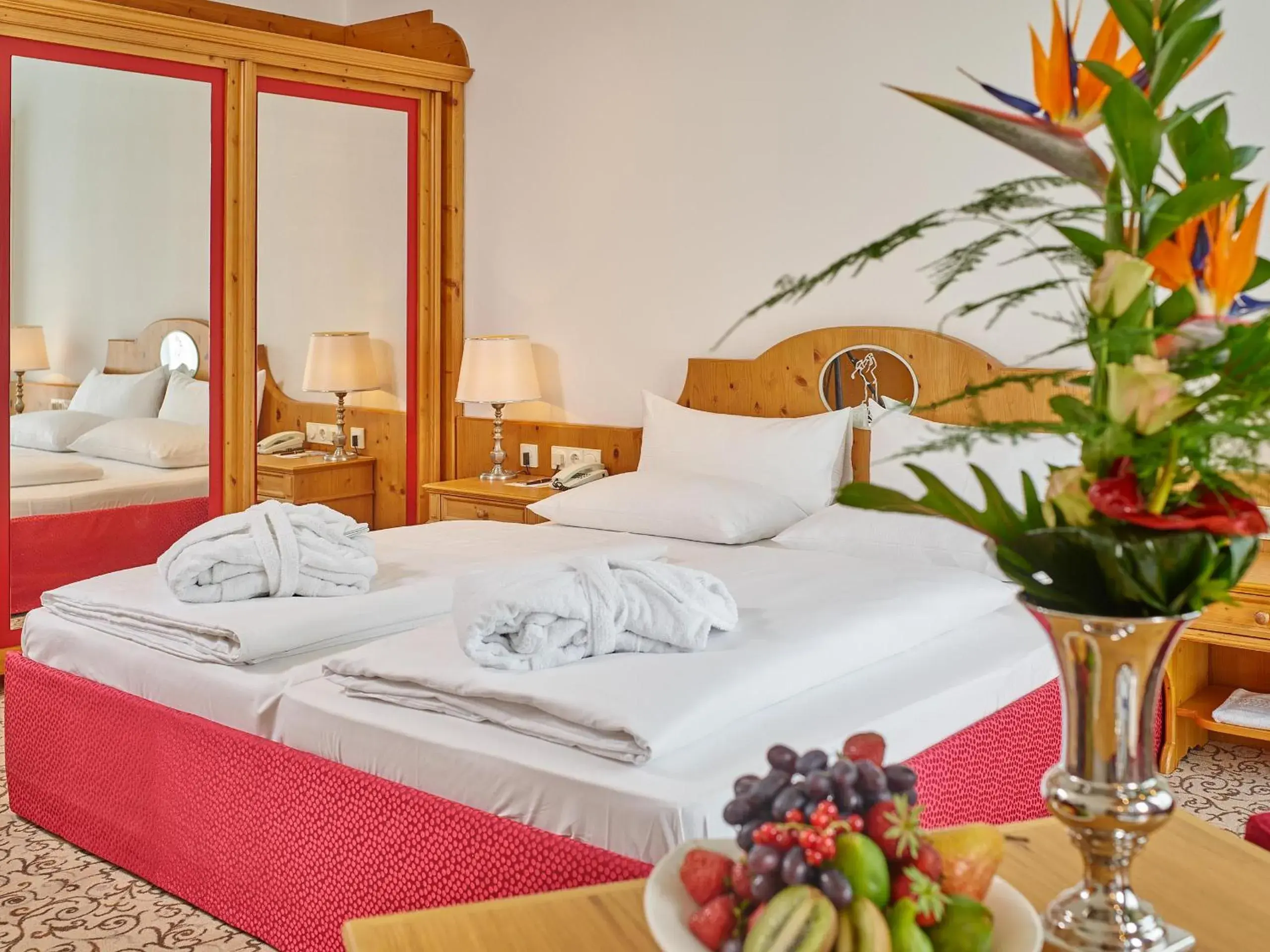 Bedroom, Bed in Hotel Maximilian - Wellness und Golfhotel