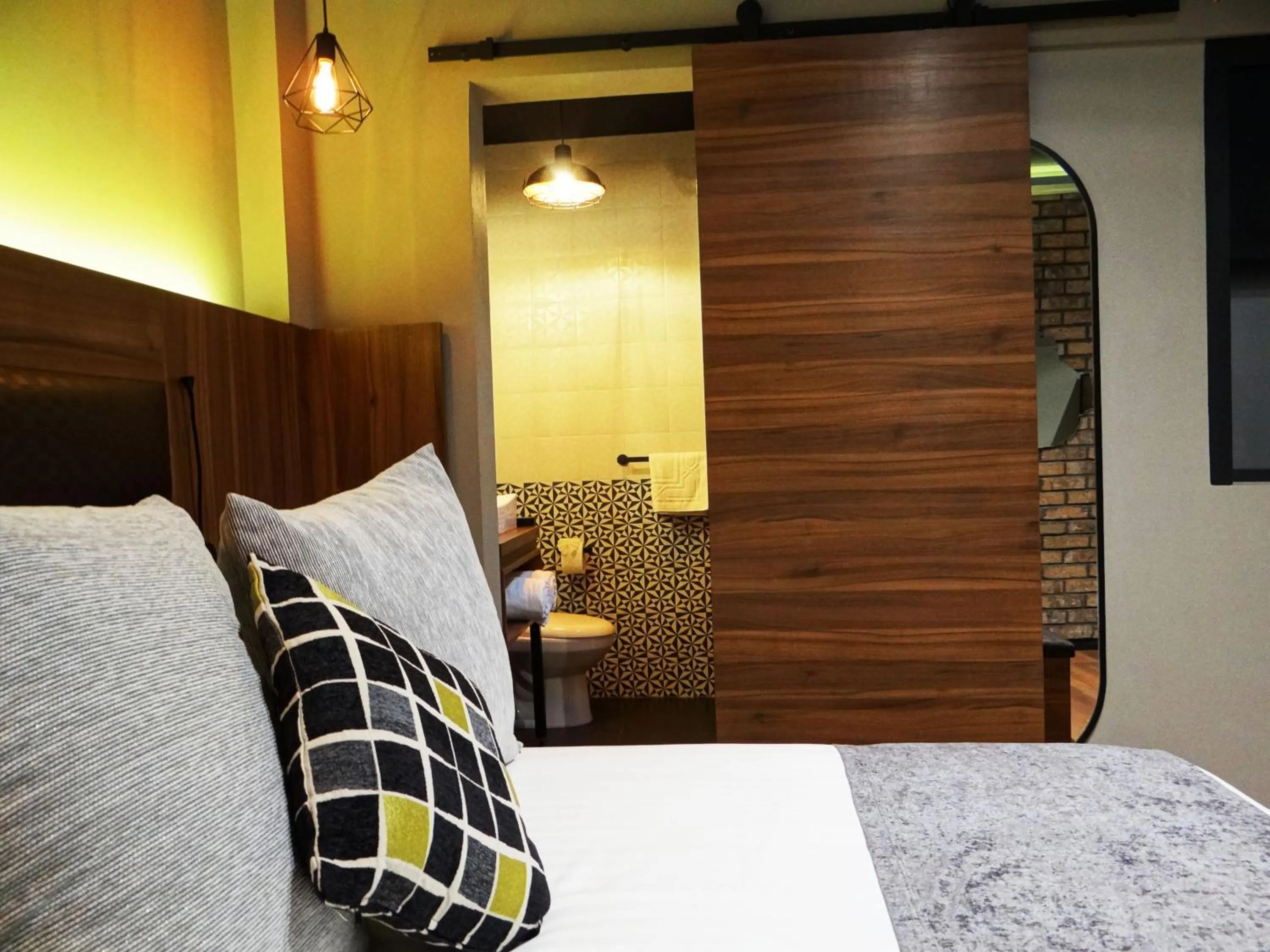 Bed in Cadillac Hotel Boutique