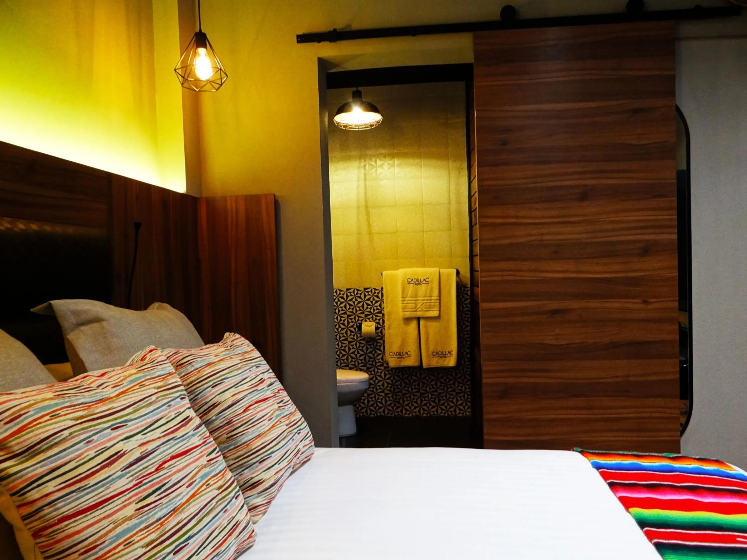 Bed in Cadillac Hotel Boutique