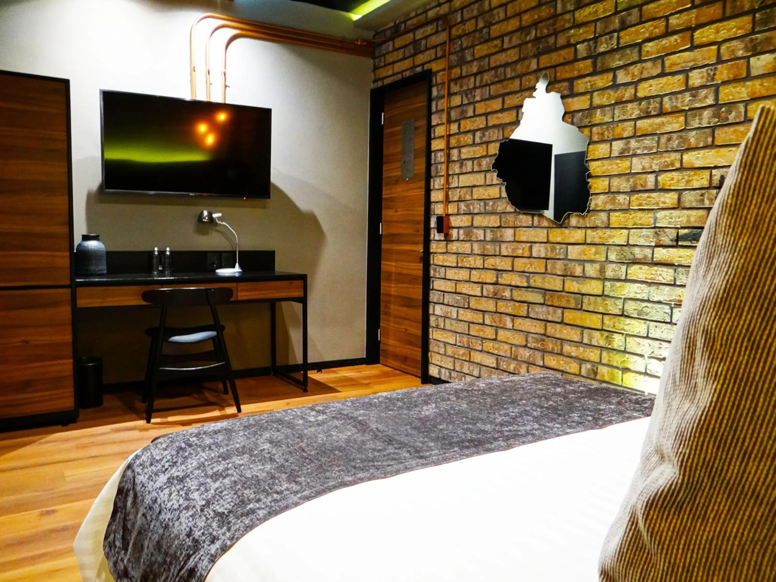 Bed in Cadillac Hotel Boutique