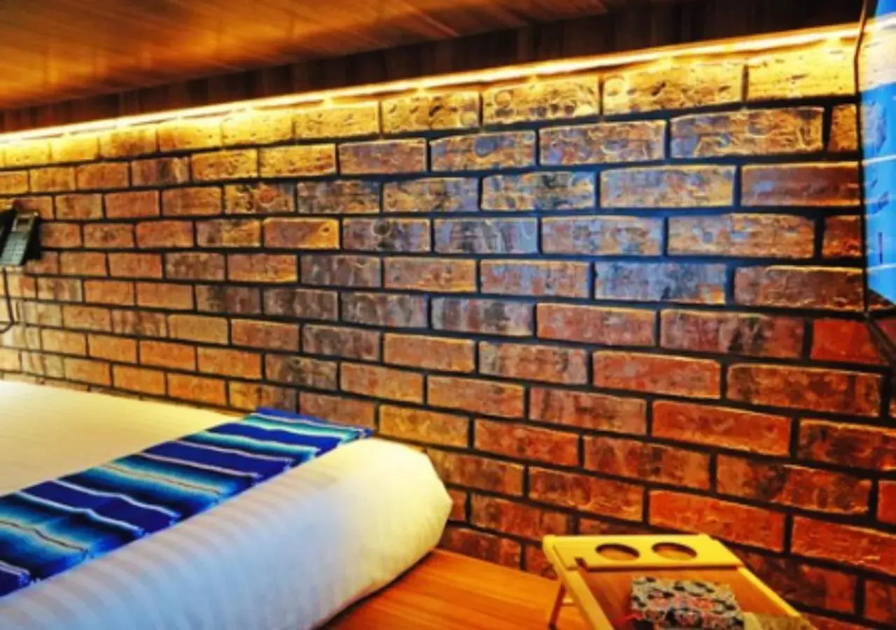 TV and multimedia, Bed in Cadillac Hotel Boutique TV and multimedia, Bed in Cadillac Hotel Boutique