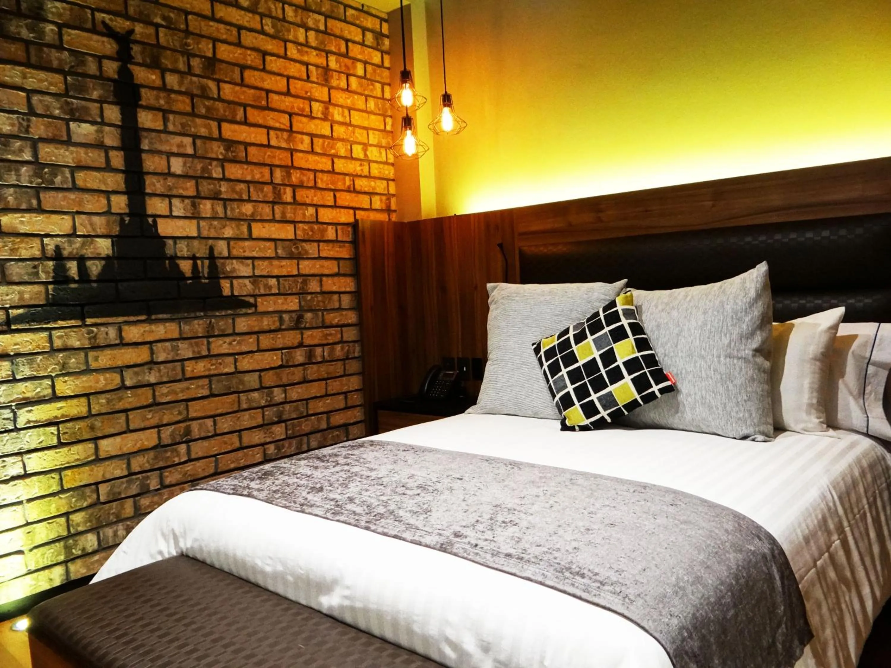 Bed in Cadillac Hotel Boutique